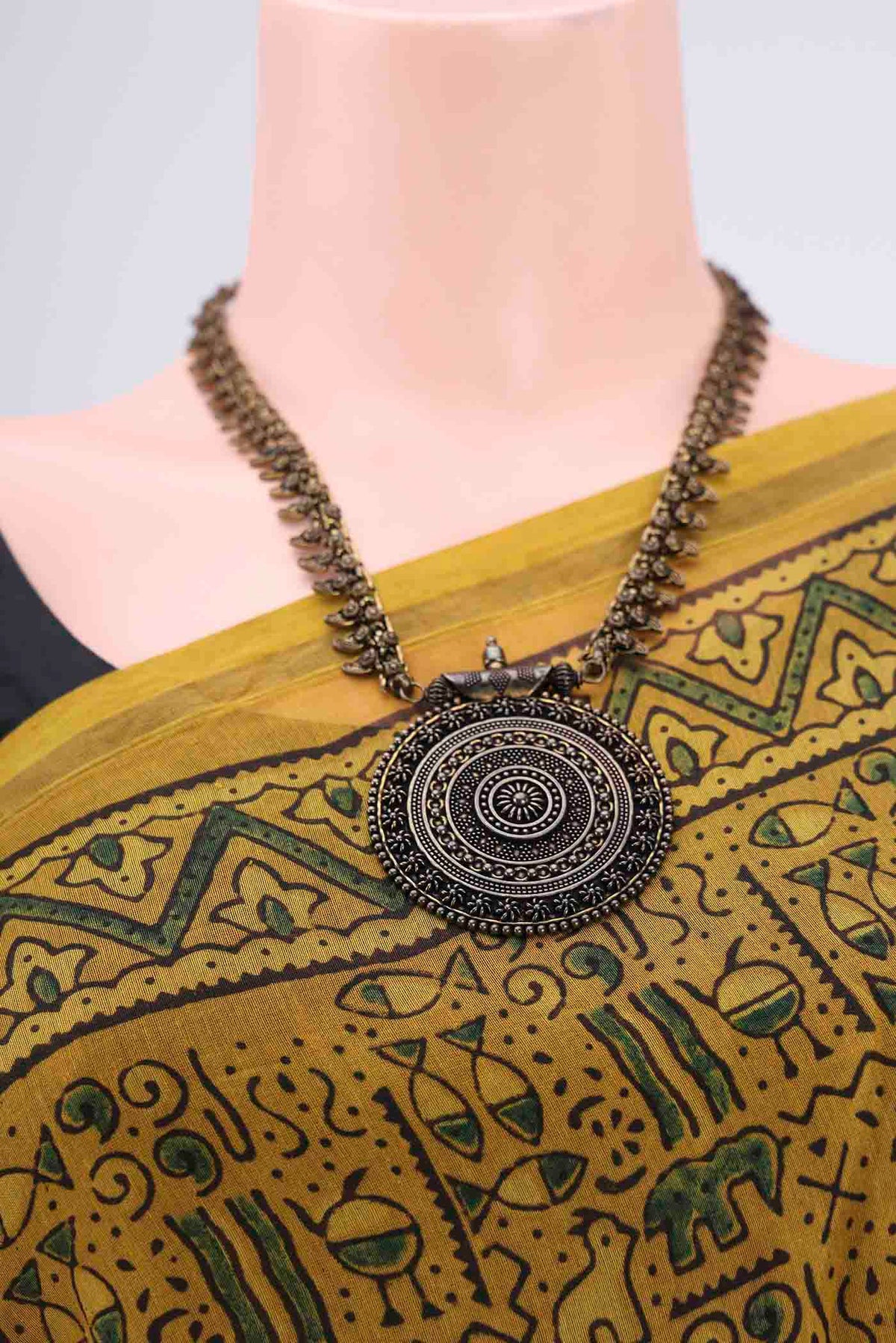 Border image of Yellow Chanderi Silk Cotton Saree with Ajrakh Print on the body and Zari Border. 