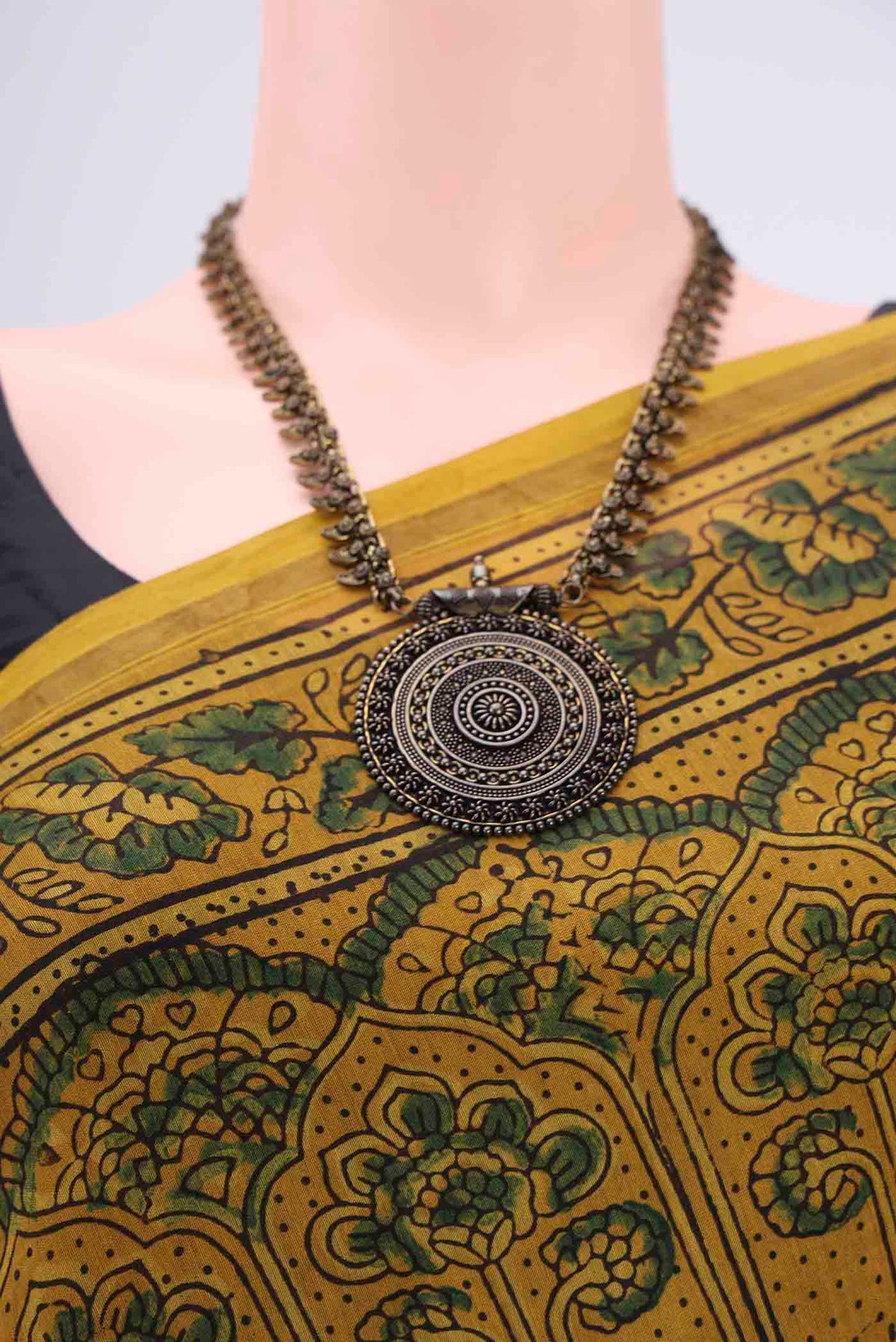 Border image of Yellow Chanderi Silk Cotton Saree with Ajrakh Print on the body and Zari Border. 