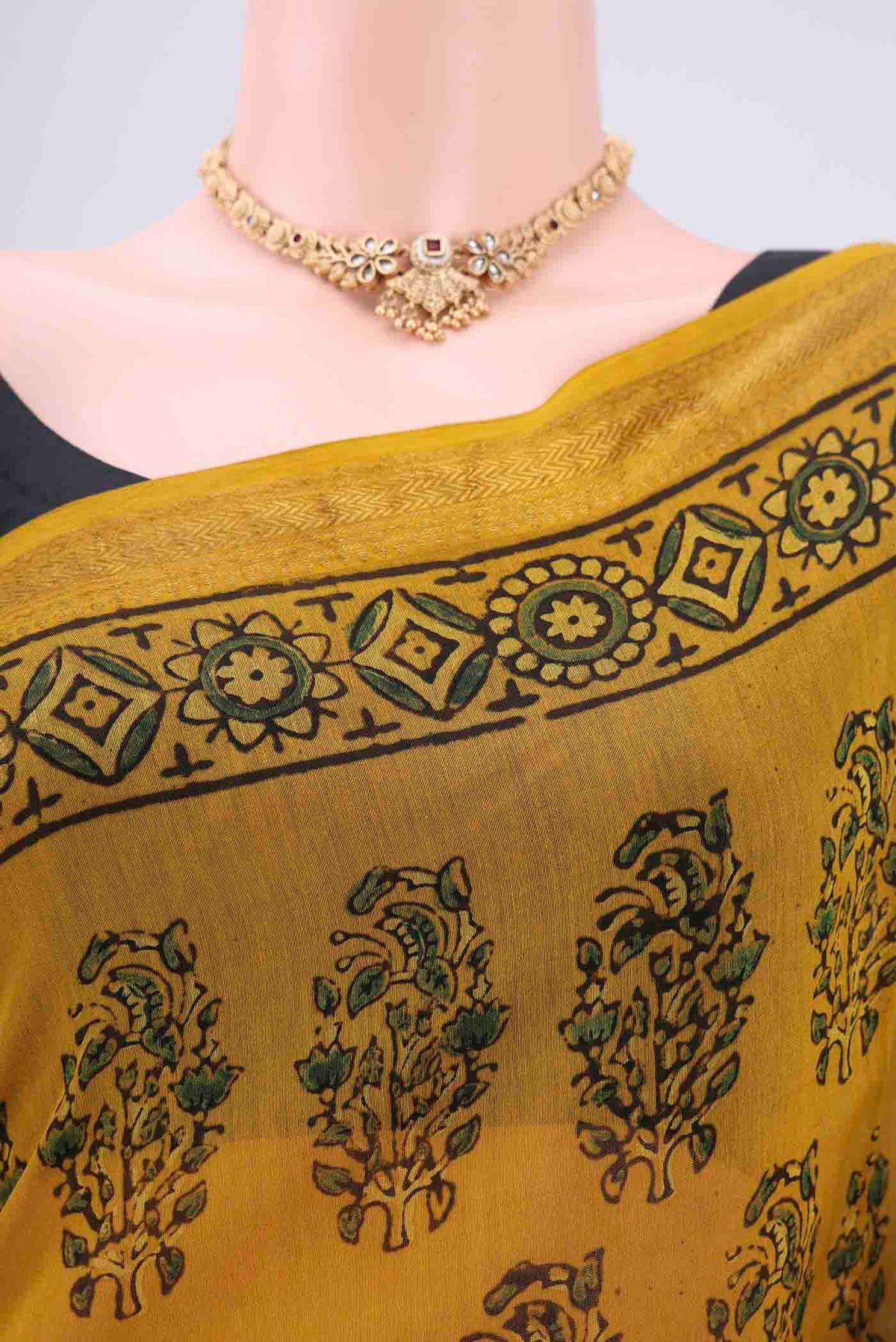 Border image of Mustard Chanderi Silk Cotton Saree with Ajrakh Print on the body and Zari Border. 
