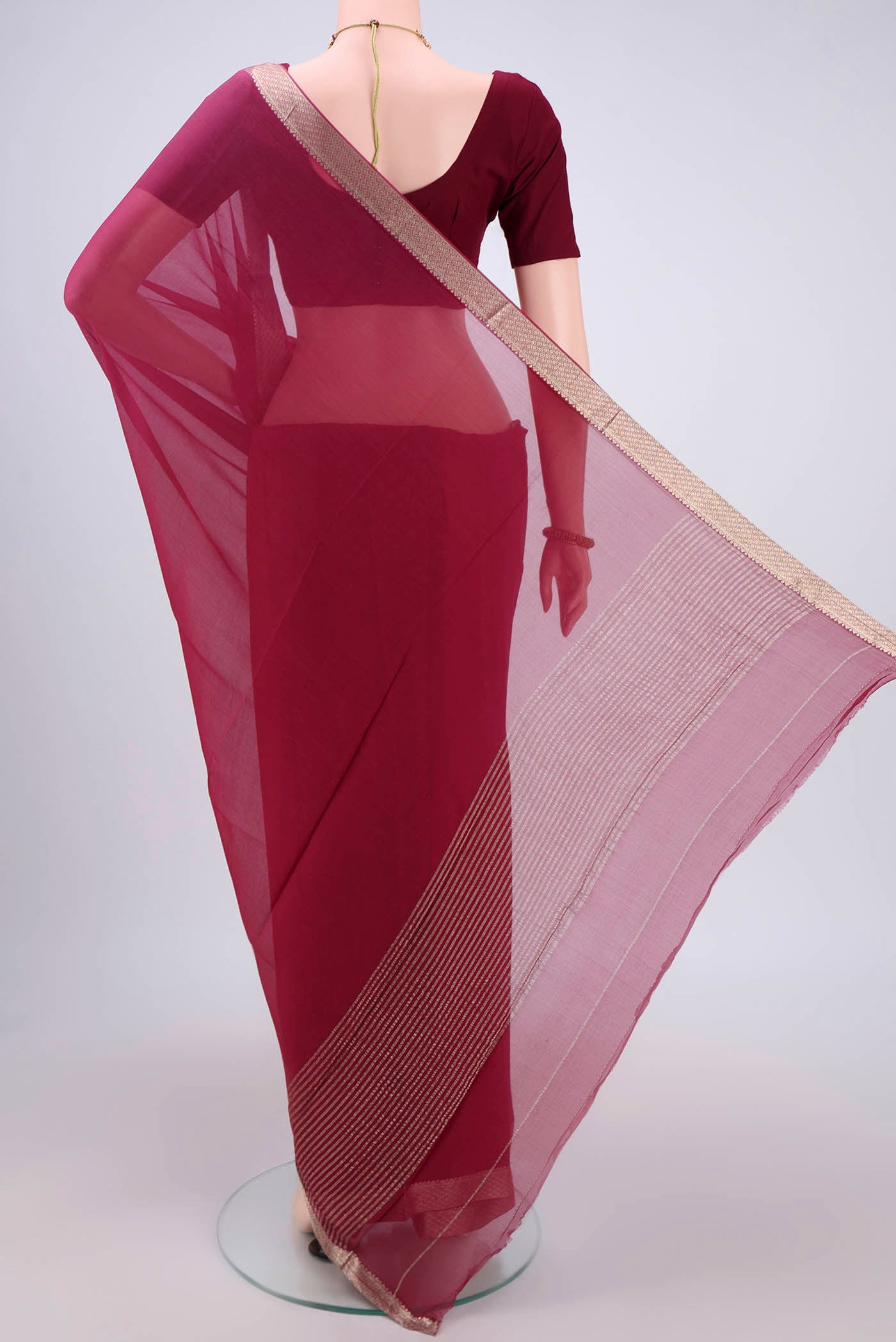 Flat view of Magenta Dual Tone Mysore Chiffon Saree with Plain Body and Zari Border. 
