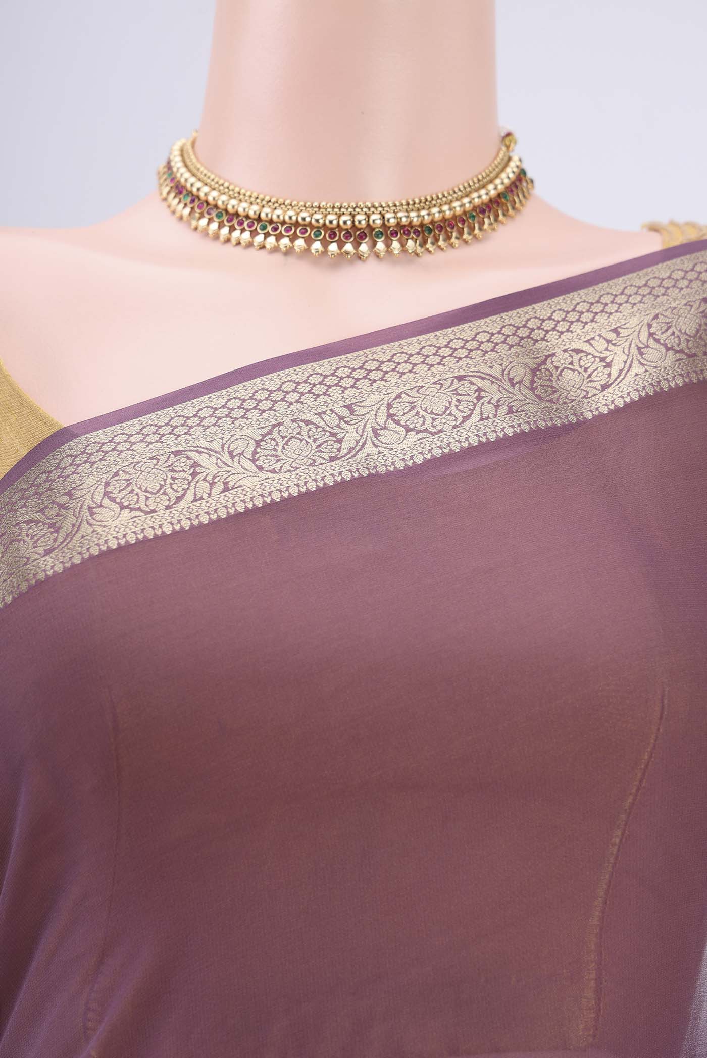 Border image of Mauve Dual Tone Mysore Georgette Saree with Plain Body and Zari Border. 