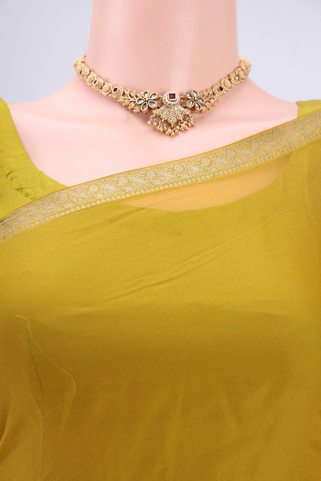 Border image of Mehandi Green Mysore Chiffon Saree with Plain Body and Zari Border. 