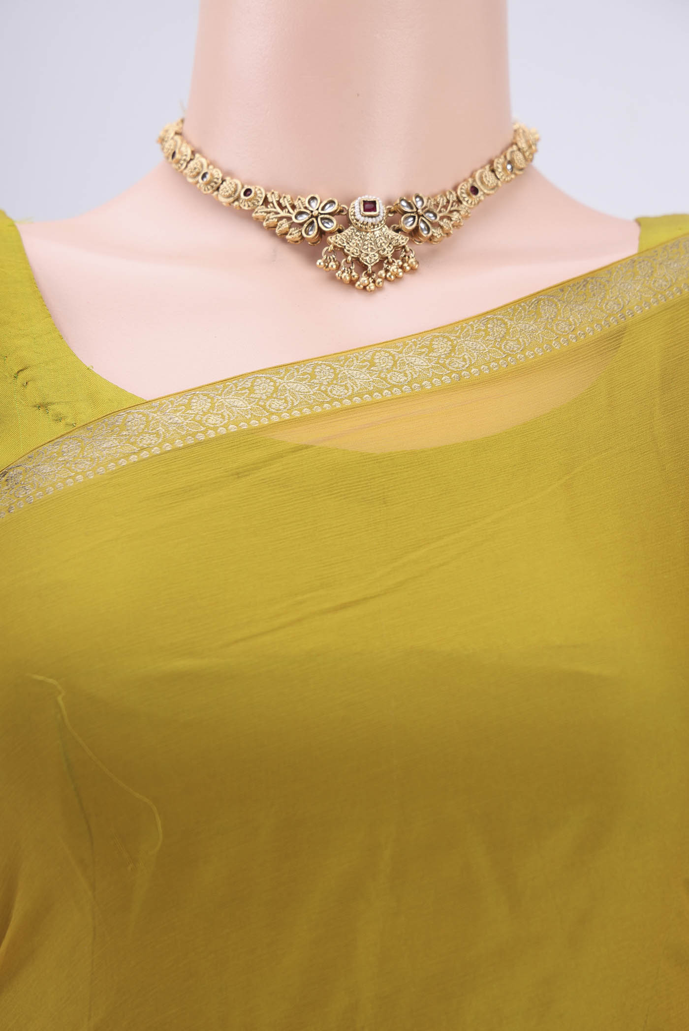 Border image of Mehandi Green Mysore Chiffon Saree with Plain Body and Zari Border. 