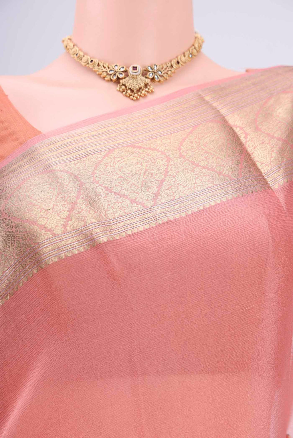 Border image of Peach Mysore Chiffon Saree with Plain Body and Zari Border. 