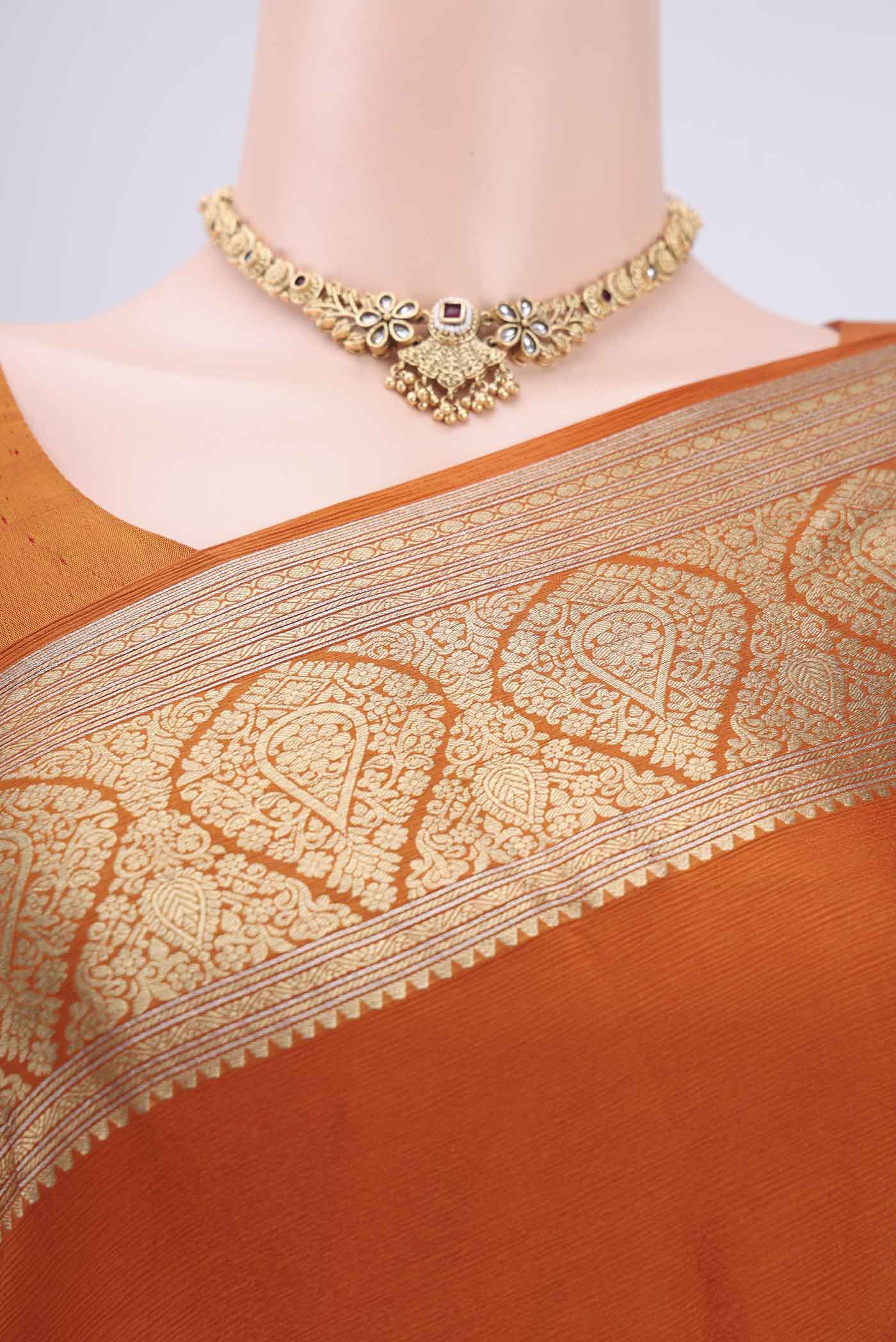 Border image of Rust Mysore Chiffon Saree with Plain Body and Zari Border. 