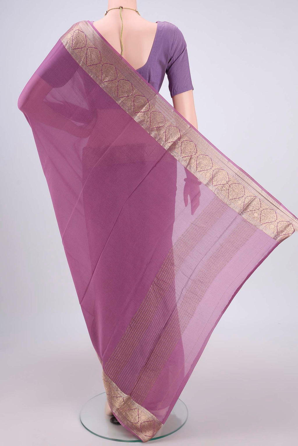 Flat view of Lavender Mysore Chiffon Saree with Plain Body and Zari Border. 