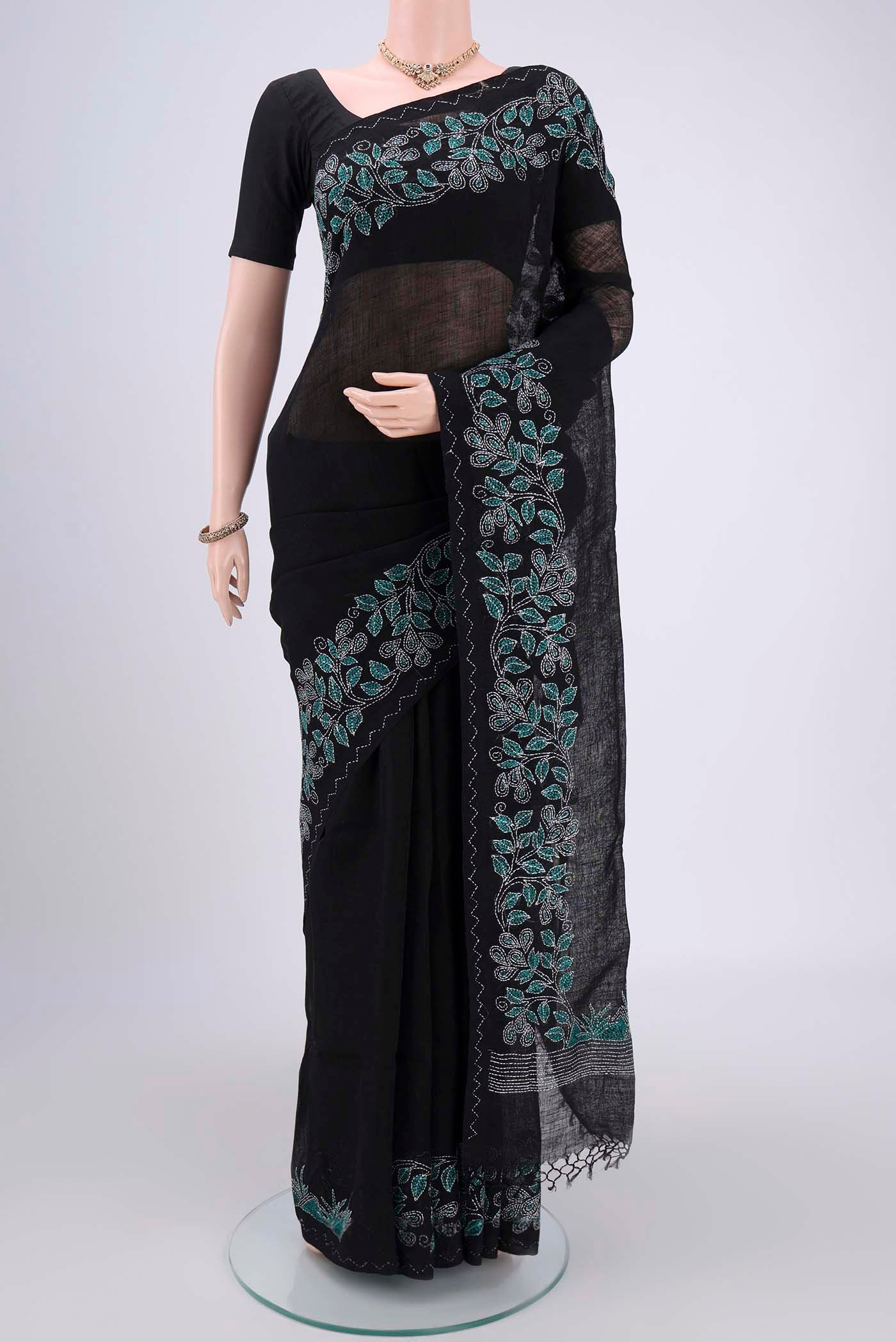 Blue Linen Saree with Kantha Work on the body and Plain Border.  displayed on a mannequin