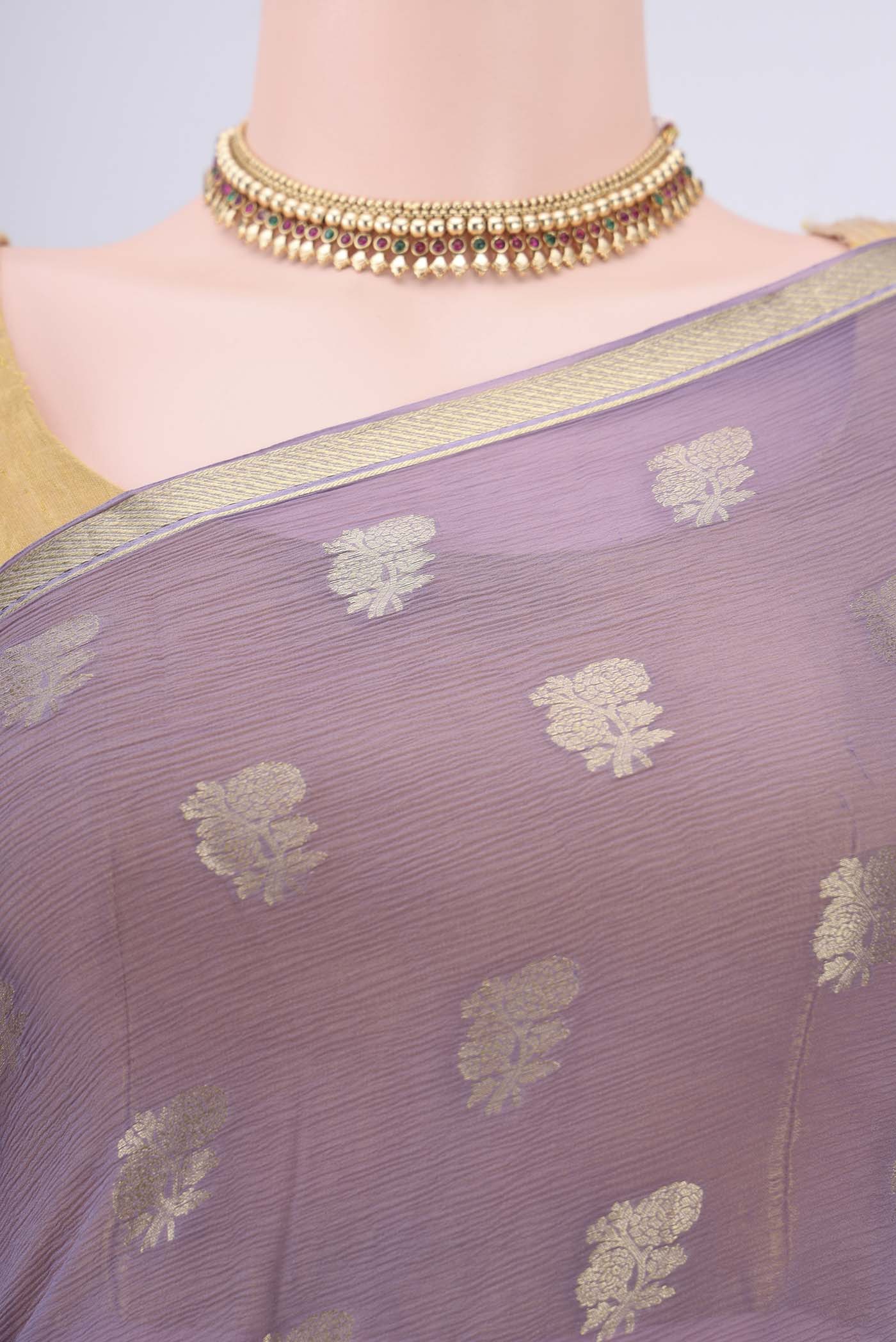 Border image of Lavender Mysore Chiffon Saree with Zari Butta on the body and Zari Border. 