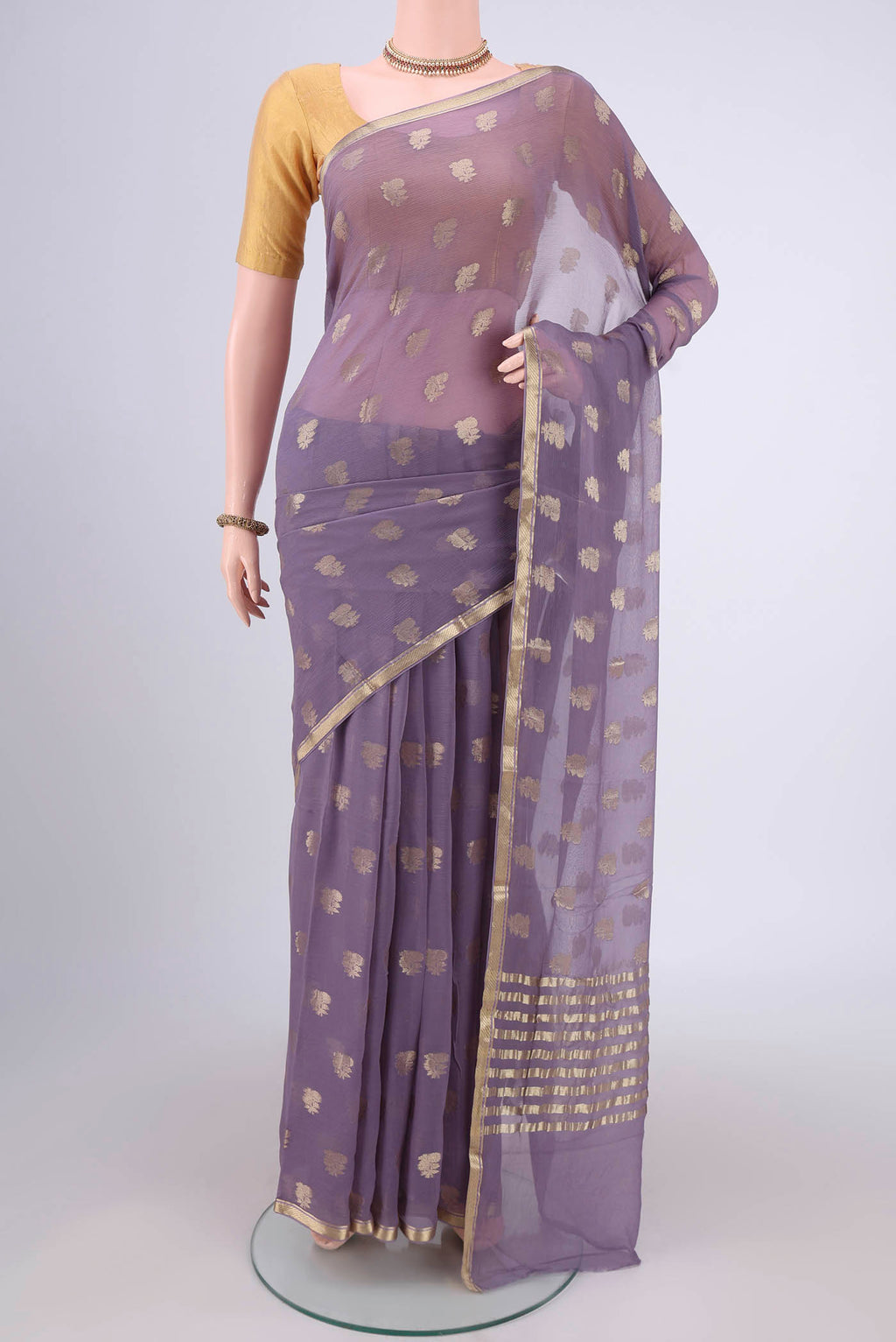Lavender Mysore Chiffon Saree with Zari Butta on the body and Zari Border.  displayed on a mannequin