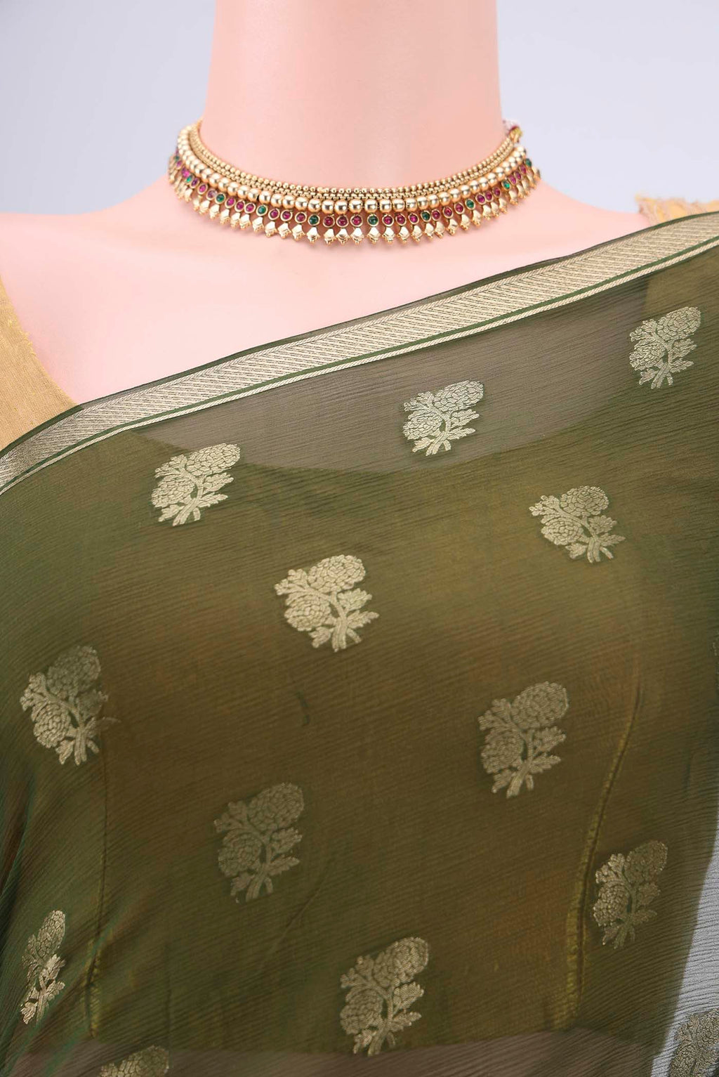 Border image of Olive Green Mysore Chiffon Saree with Zari Butta on the body and Zari Border. 
