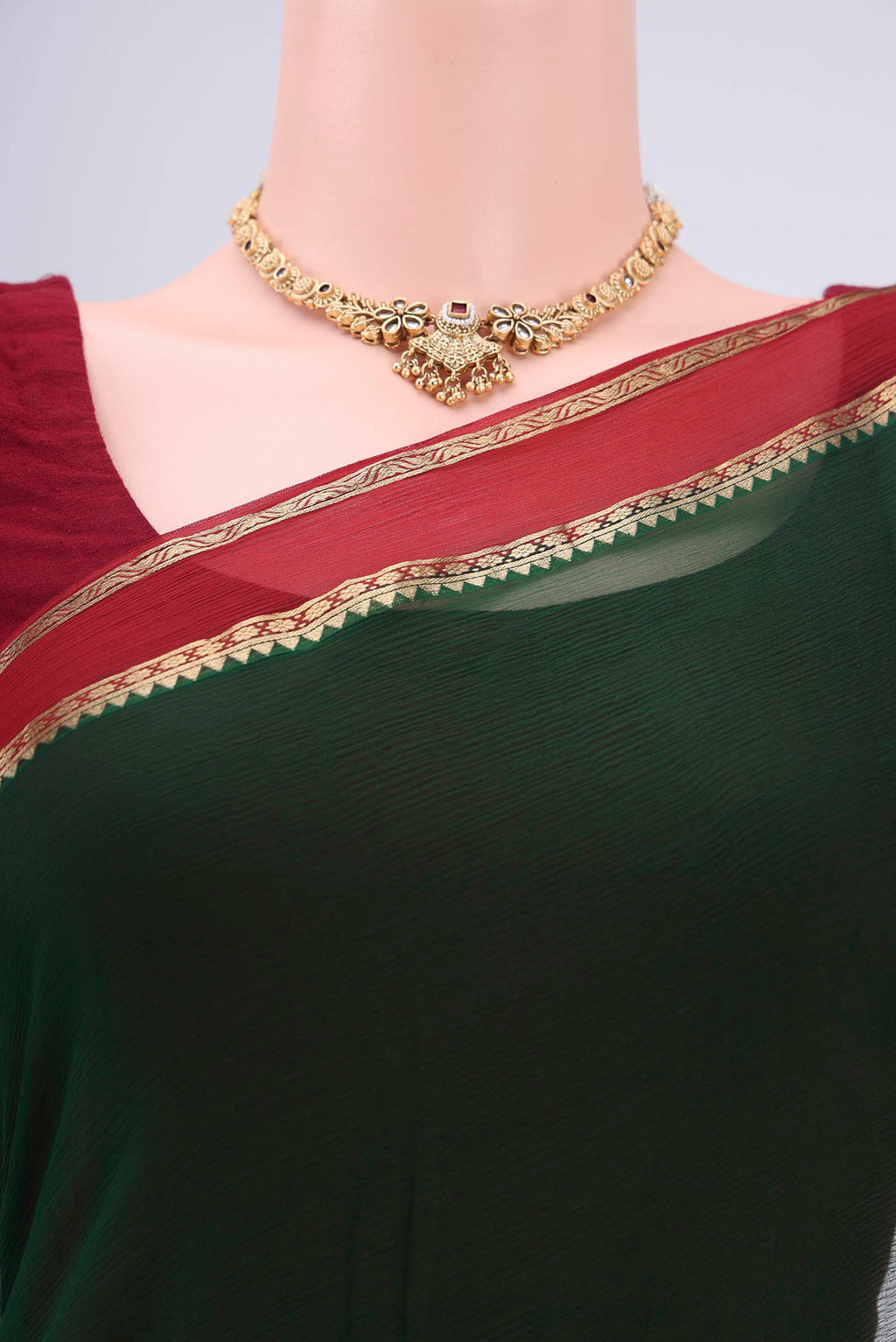 Border image of Bottle Green Dual Tone Mysore Chiffon Saree with Plain Body and Zari Border. 