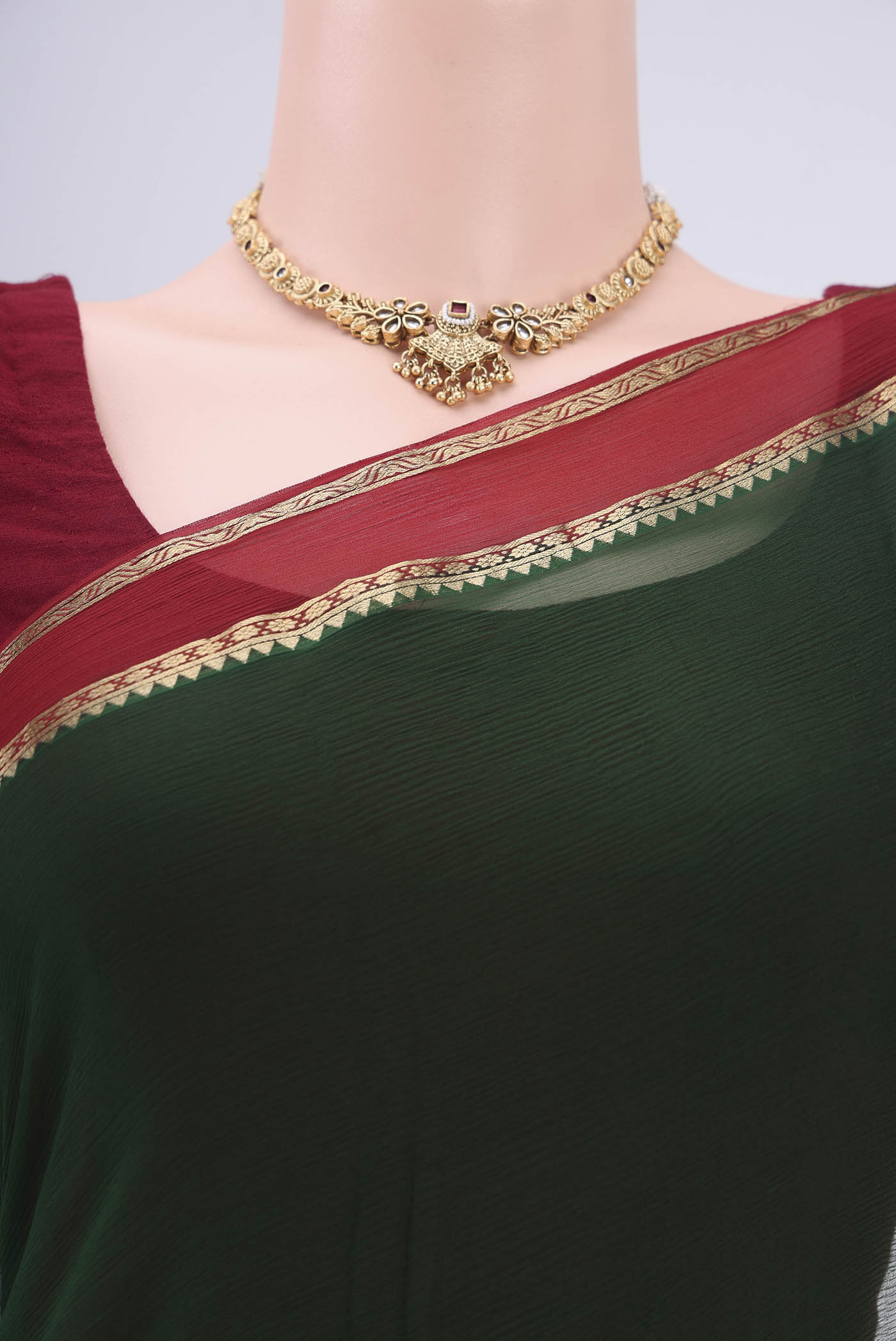 Border image of Bottle Green Dual Tone Mysore Chiffon Saree with Plain Body and Zari Border. 