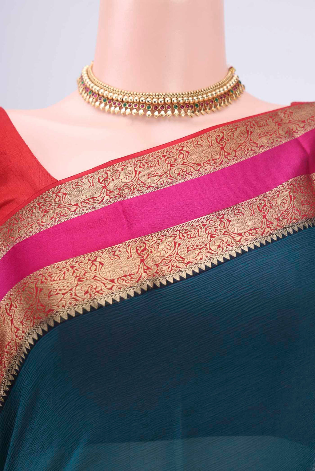 Border image of Turquoise Dual Tone Mysore Chiffon Saree with Plain Body and Zari Border. 