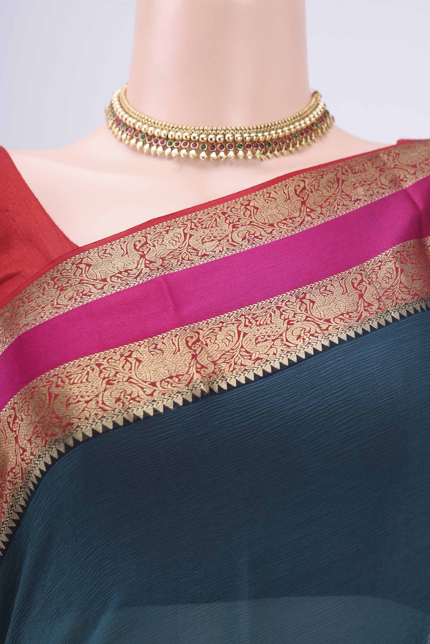 Border image of Turquoise Dual Tone Mysore Chiffon Saree with Plain Body and Zari Border. 