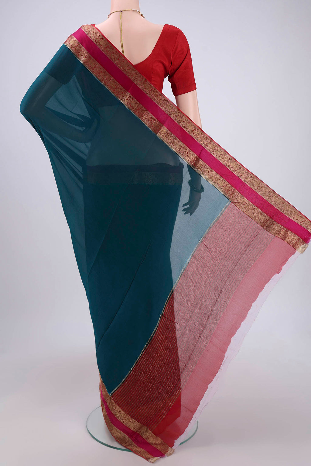 Flat view of Turquoise Dual Tone Mysore Chiffon Saree with Plain Body and Zari Border. 