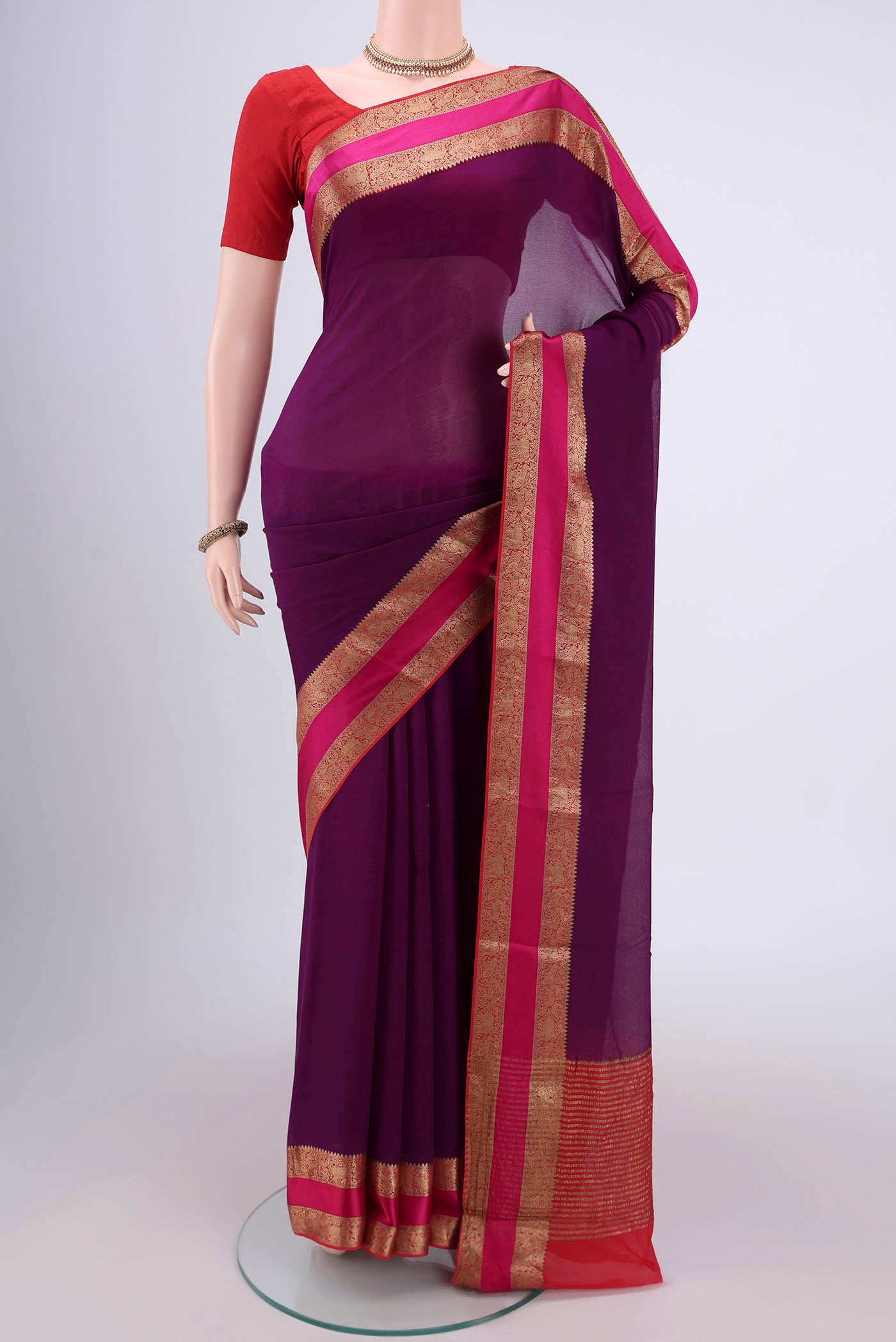 Purple Mysore Chiffon Saree with Plain Body and Zari Border.  displayed on a mannequin