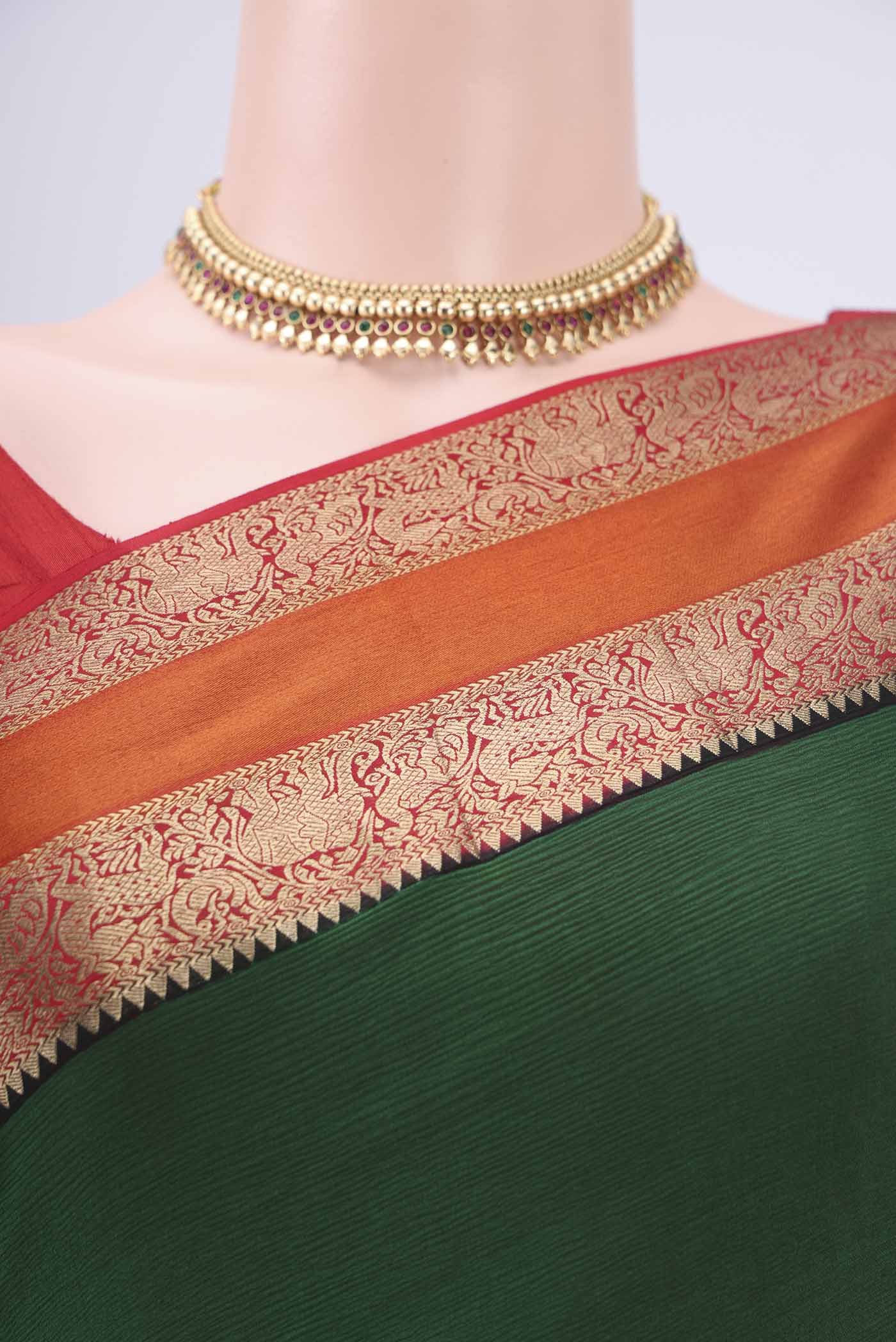 Border image of Green Mysore Chiffon Saree with Plain Body and Zari Border. 