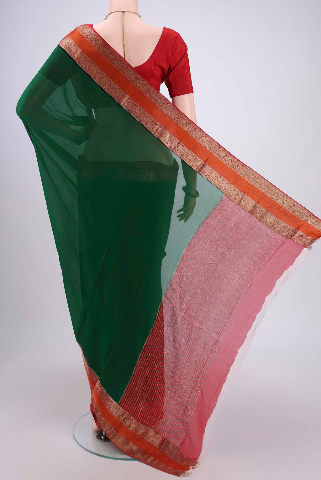 Flat view of Green Mysore Chiffon Saree with Plain Body and Zari Border. 