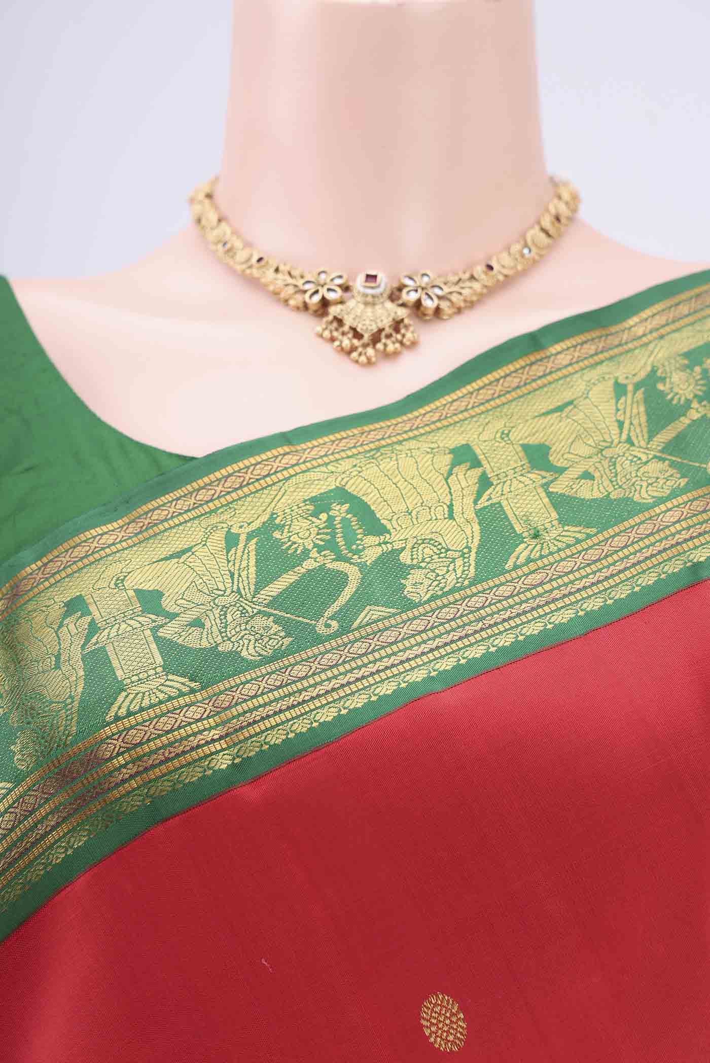 Border image of Red Dual Tone Kanjivaram Silk Saree with Zari Butta on the body and Zari Border. 