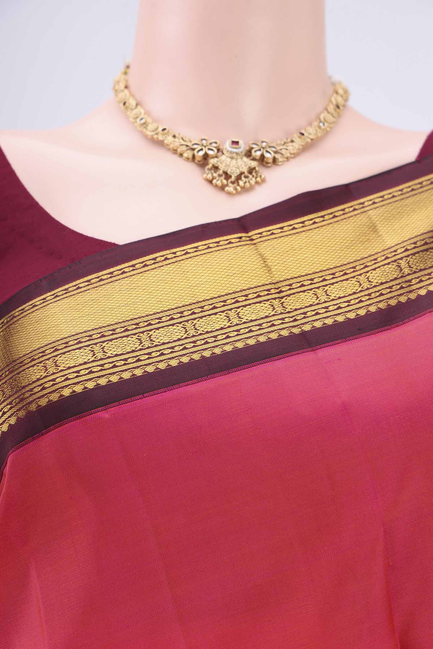 Border image of Dark Pink Kanchipuram Silk Saree with Plain Body and Zari Border. 