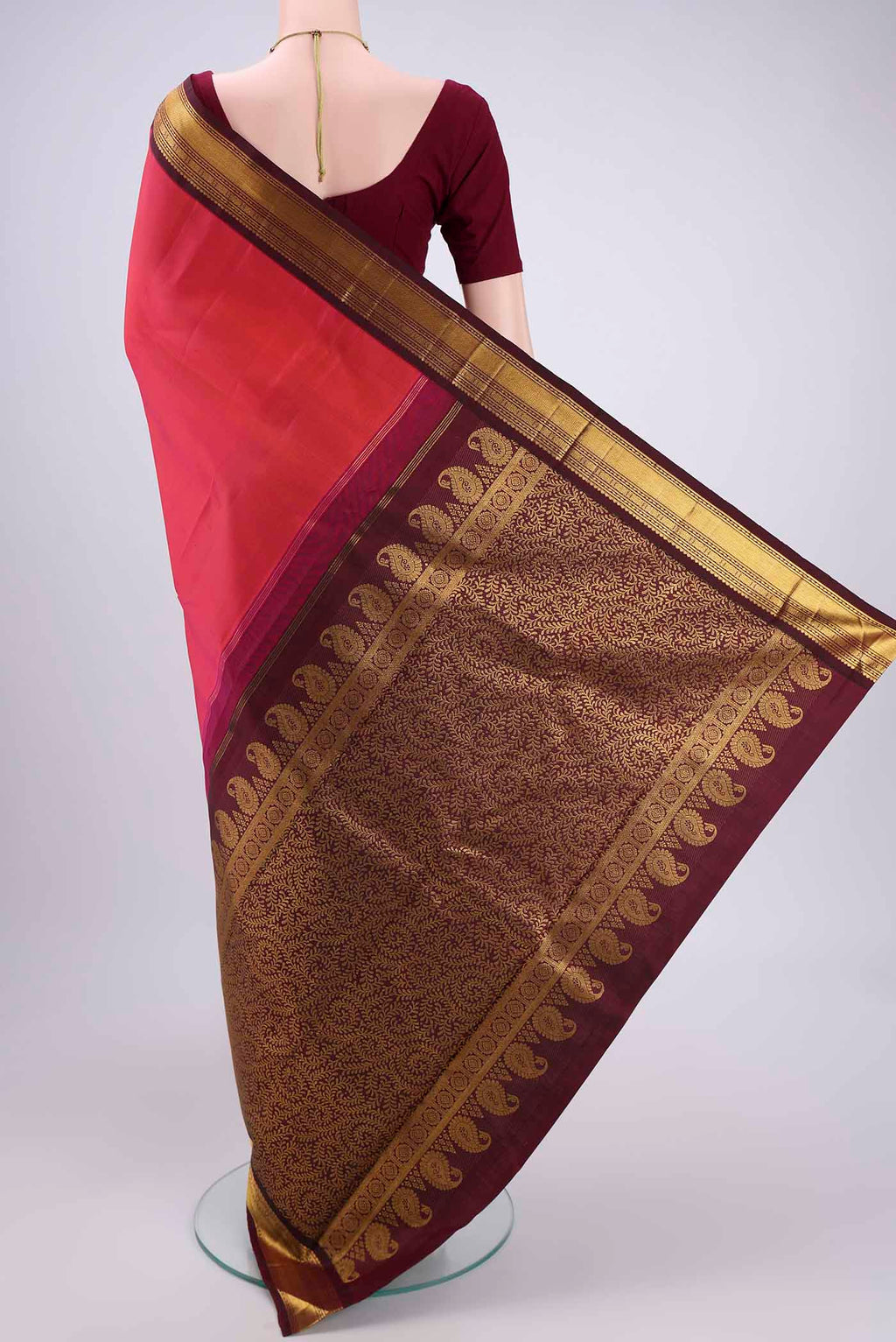 Flat view of Dark Pink Kanchipuram Silk Saree with Plain Body and Zari Border. 