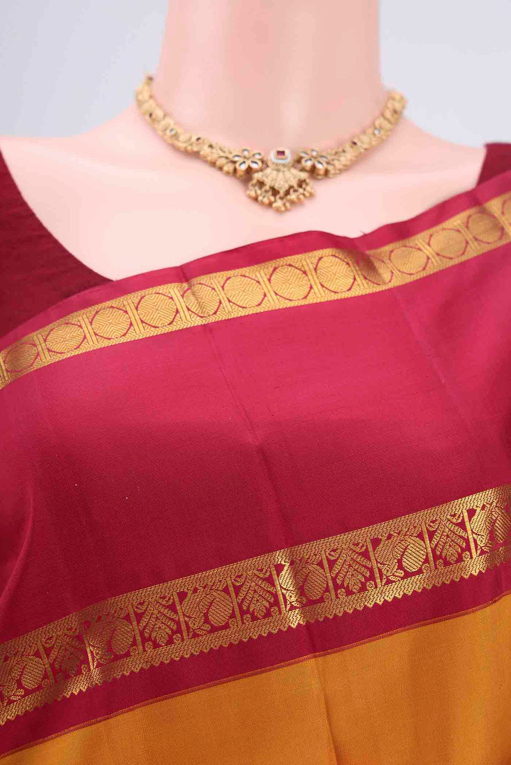 Border image of Mustard Kanchipuram Silk Saree with Plain Body and Zari Border. 