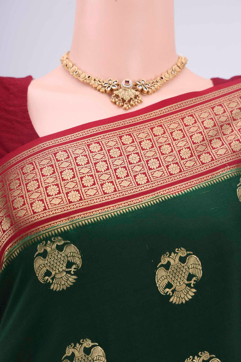 Border image of Bottle Green Mysore Crepe Saree with Jacquard design on the body and Zari Border. 