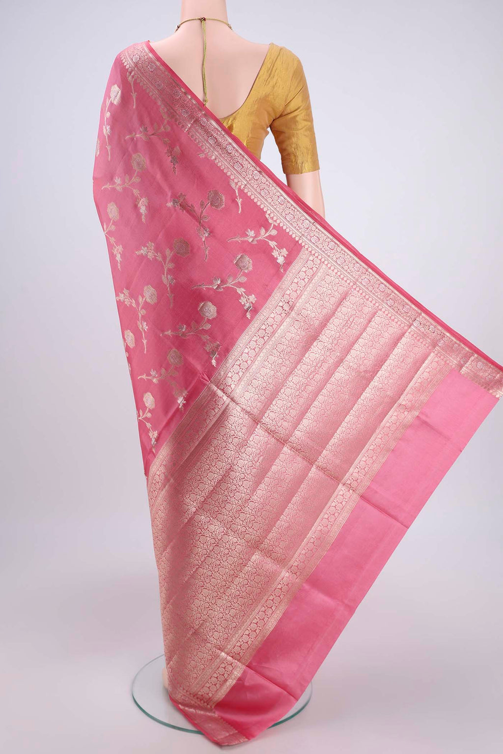 Flat view of Peach Banarasi Raw Silk Saree with Zari Brocade on the body and Zari Border. 