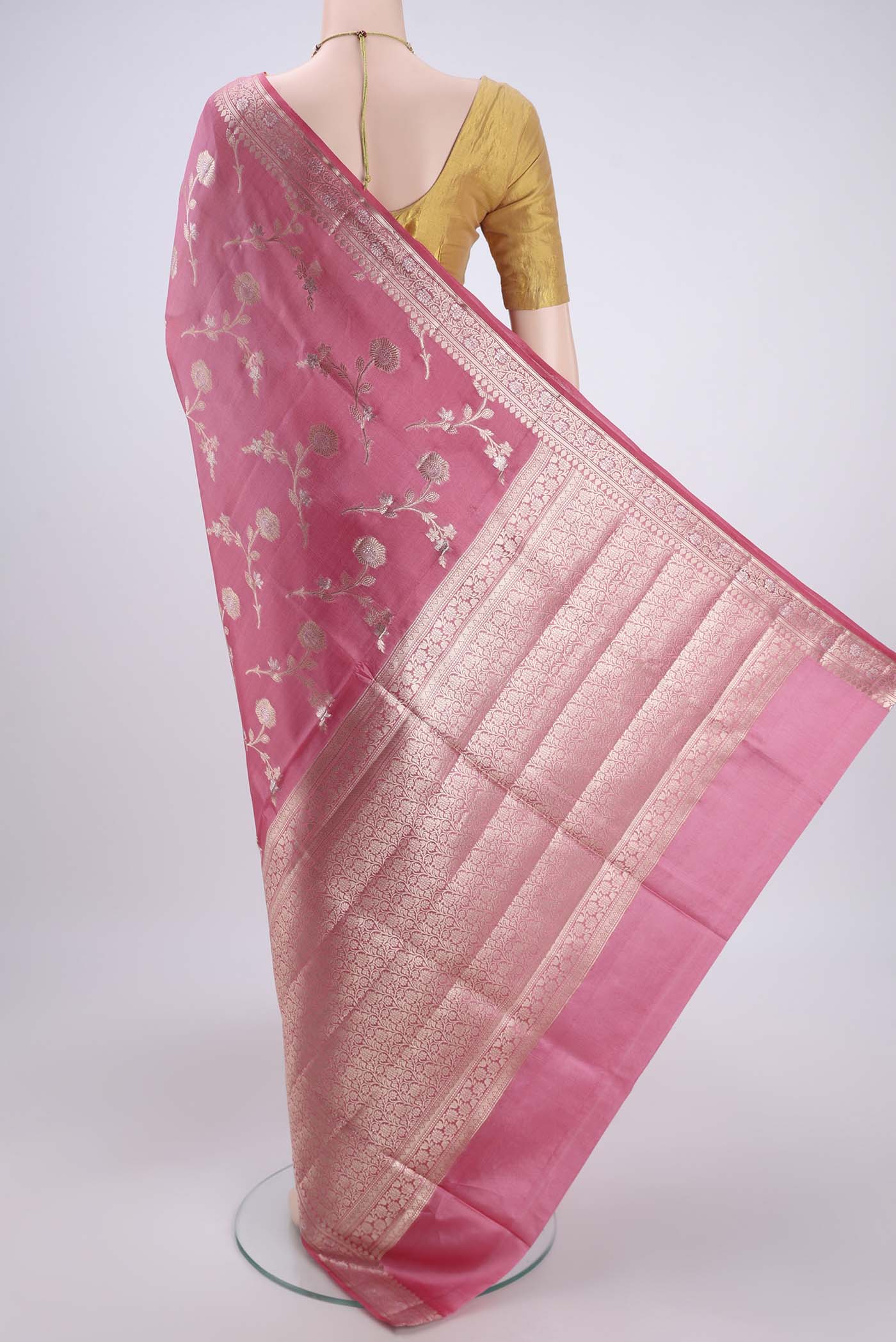 Flat view of Peach Banarasi Raw Silk Saree with Zari Brocade on the body and Zari Border. 