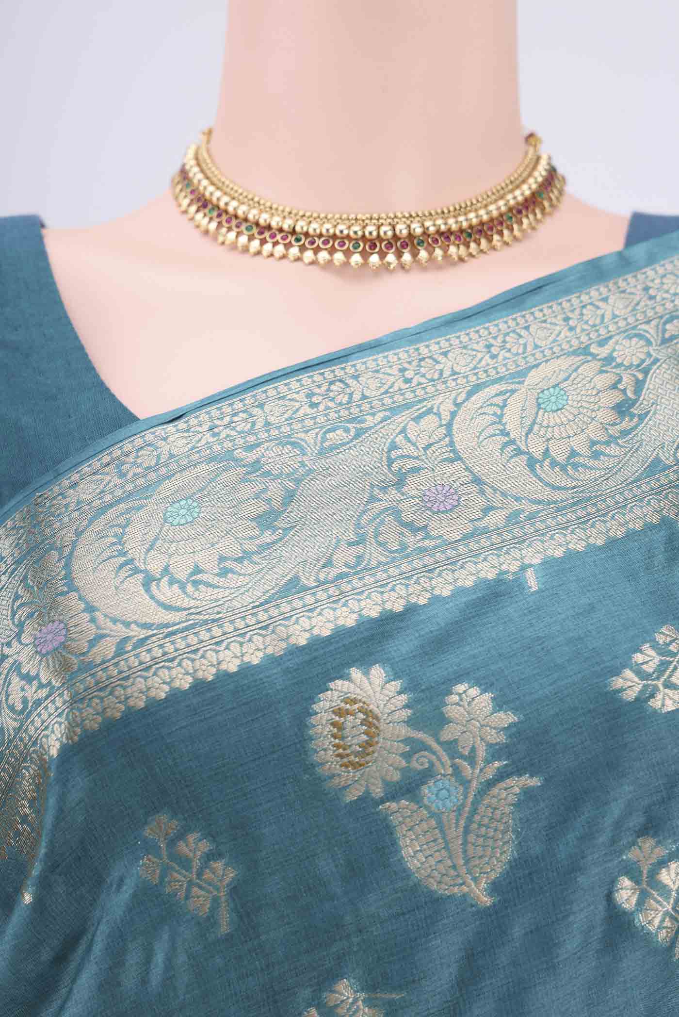 Border image of Turquoise Banarasi Tussar Silk Saree with Zari And Thread Butta on the body and Zari And Thread Border. 