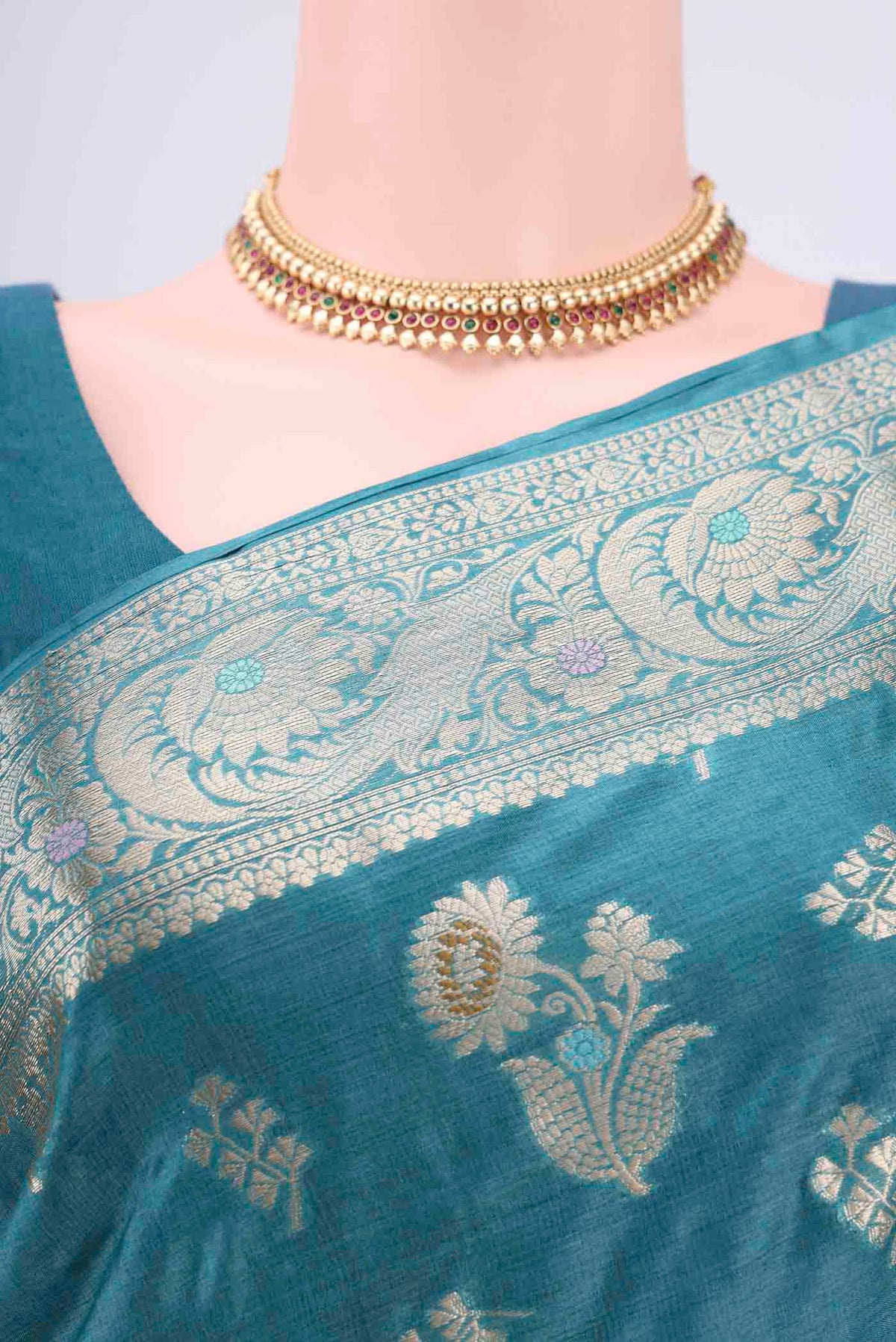 Border image of Turquoise Banarasi Tussar Silk Saree with Zari And Thread Butta on the body and Zari And Thread Border. 