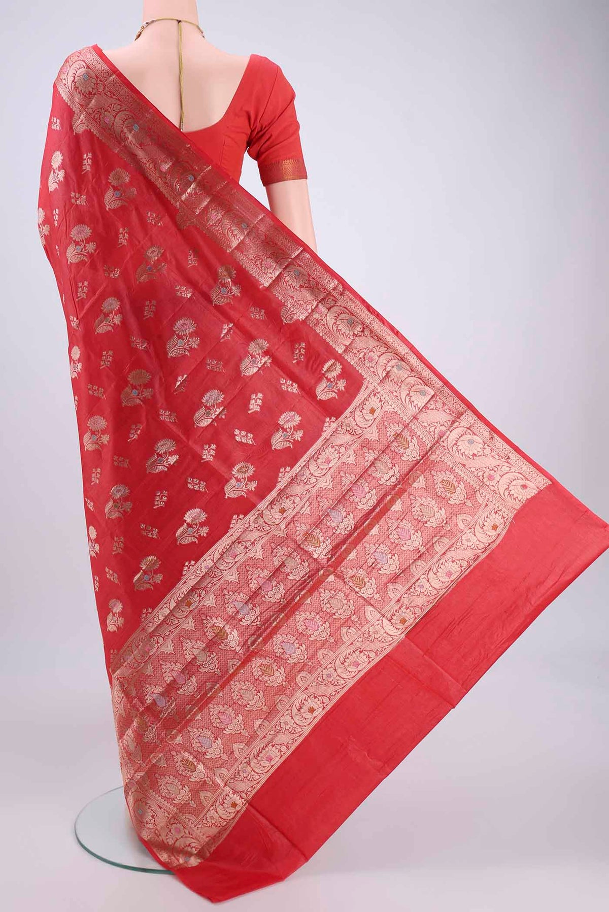 Flat view of Imperial Red Banarasi Tussar Silk Saree with Zari And Thread Butta on the body and Zari And Thread Border. 