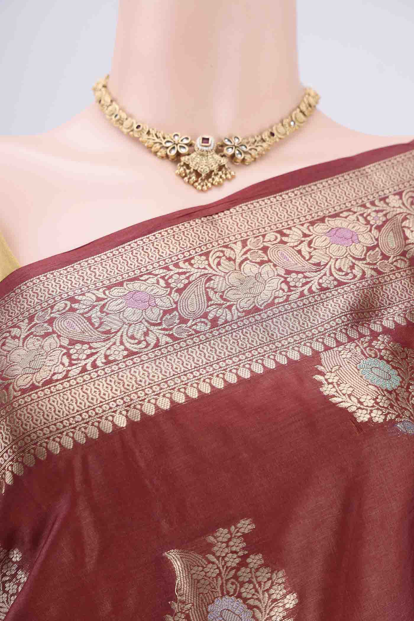 Border image of Brown Banarasi Tussar Silk Saree with Zari And Thread Butta on the body and Zari And Thread Border. 