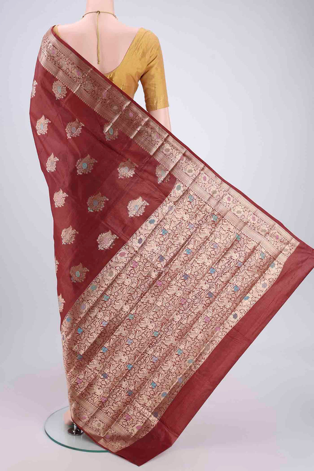Flat view of Brown Banarasi Tussar Silk Saree with Zari And Thread Butta on the body and Zari And Thread Border. 