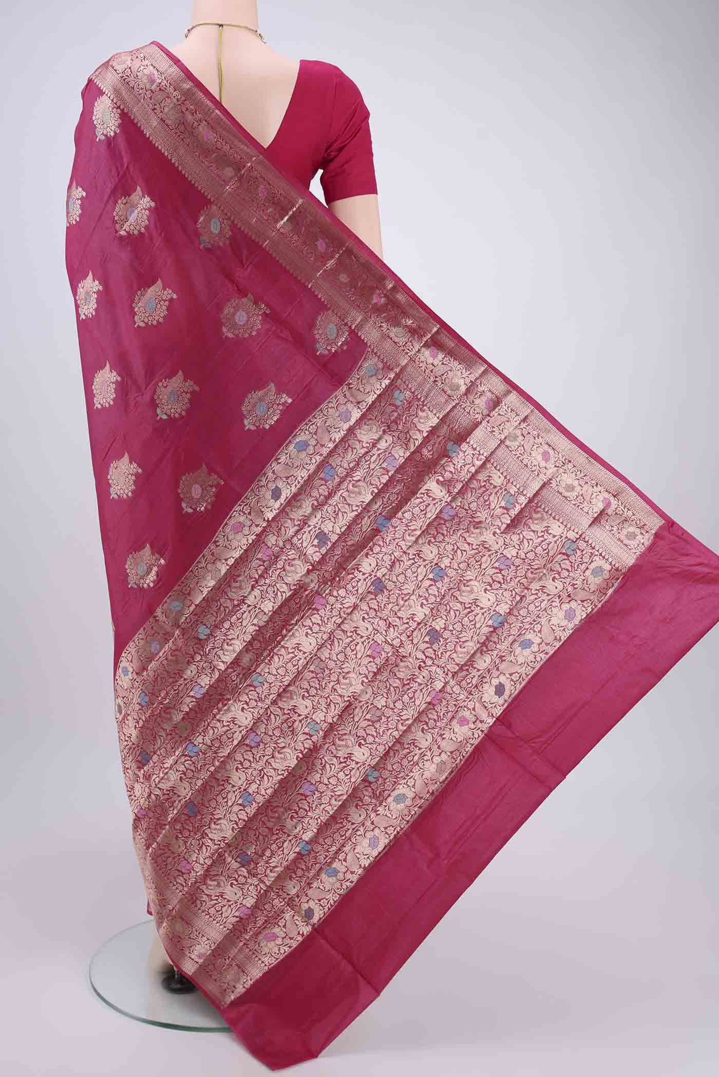 Flat view of Pink Banarasi Tussar Silk Saree with Zari And Thread Butta on the body and Zari And Thread Border. 