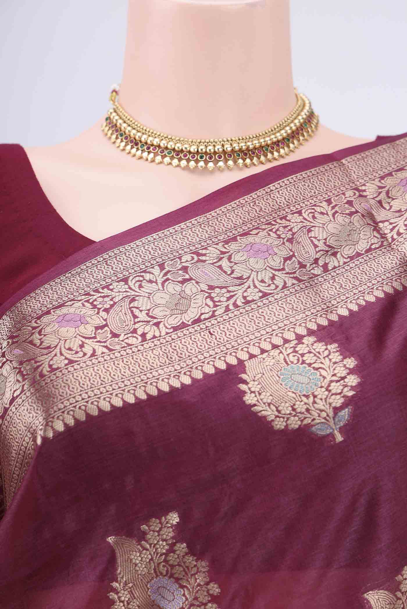 Border image of Magenta Banarasi Tussar Silk Saree with Zari And Thread Butta on the body and Zari And Thread Border. 