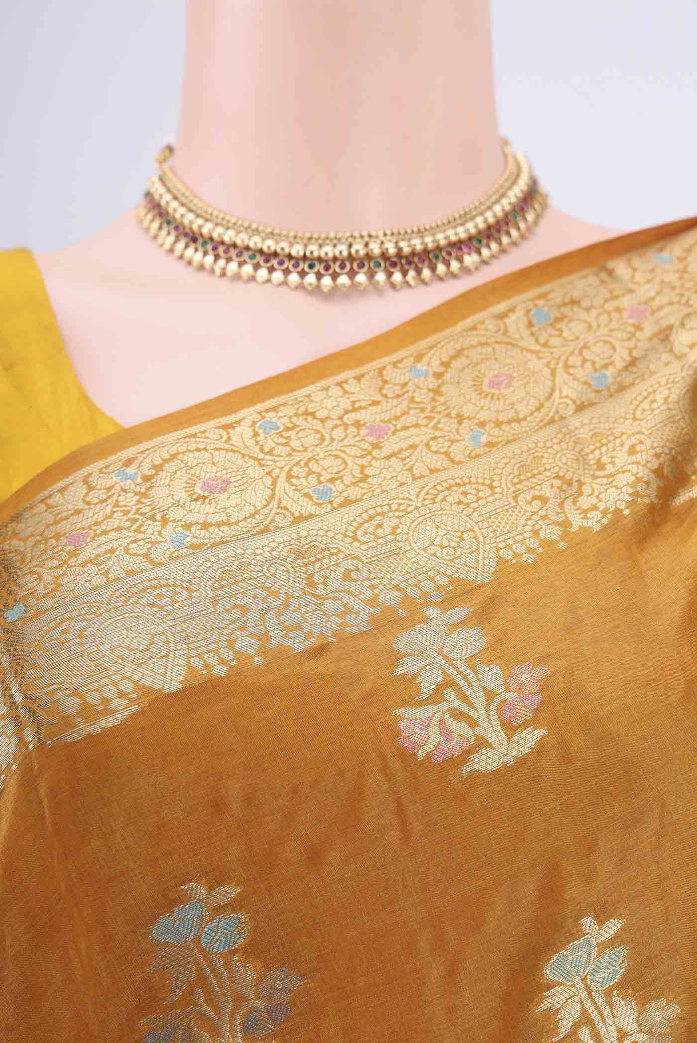 Border image of Mustard Banarasi Tussar Silk Saree with Zari And Thread Butta on the body and Zari And Thread Border. 