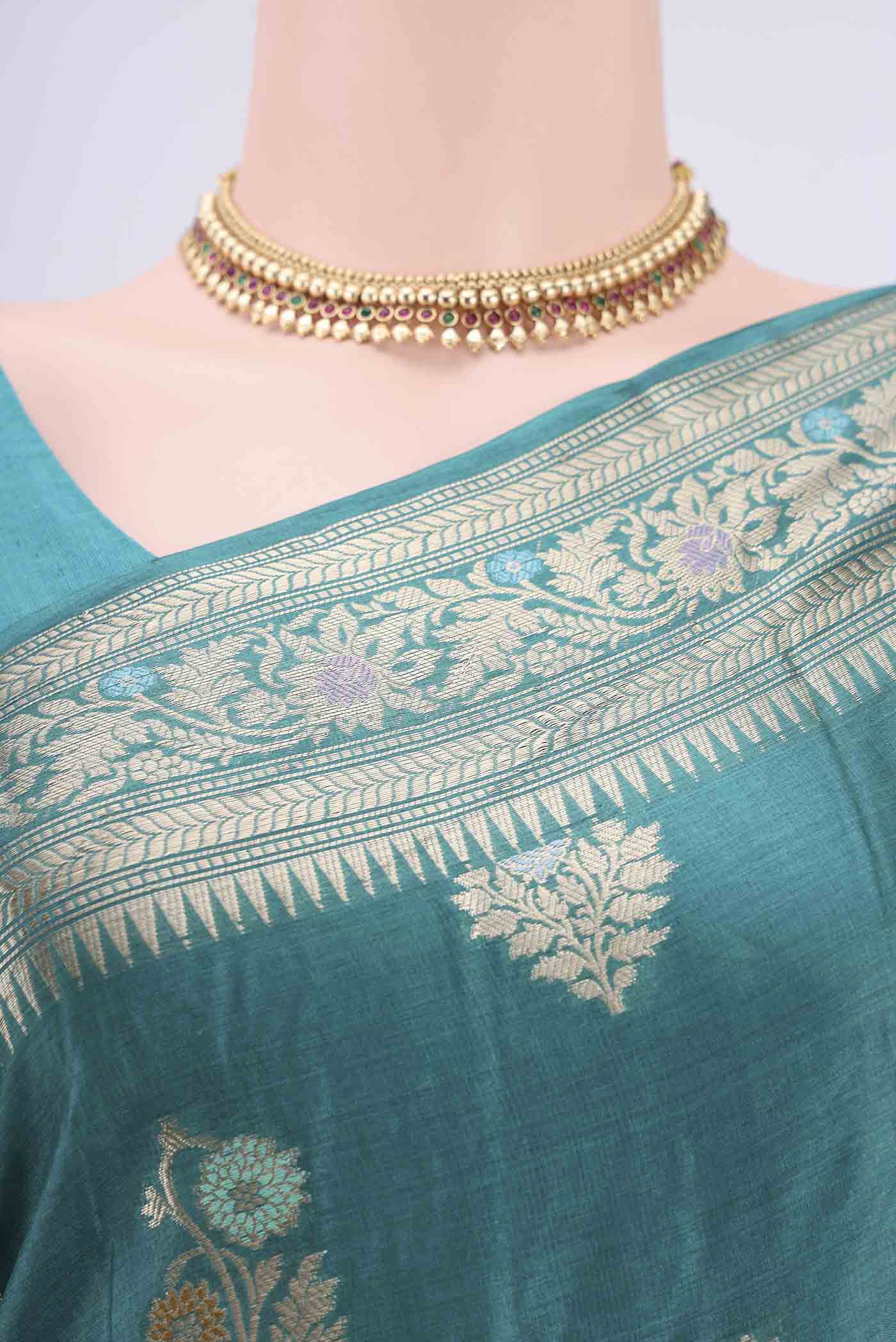 Border image of Turquoise Banarasi Tussar Silk Saree with Zari And Thread Butta on the body and Zari And Thread Border. 