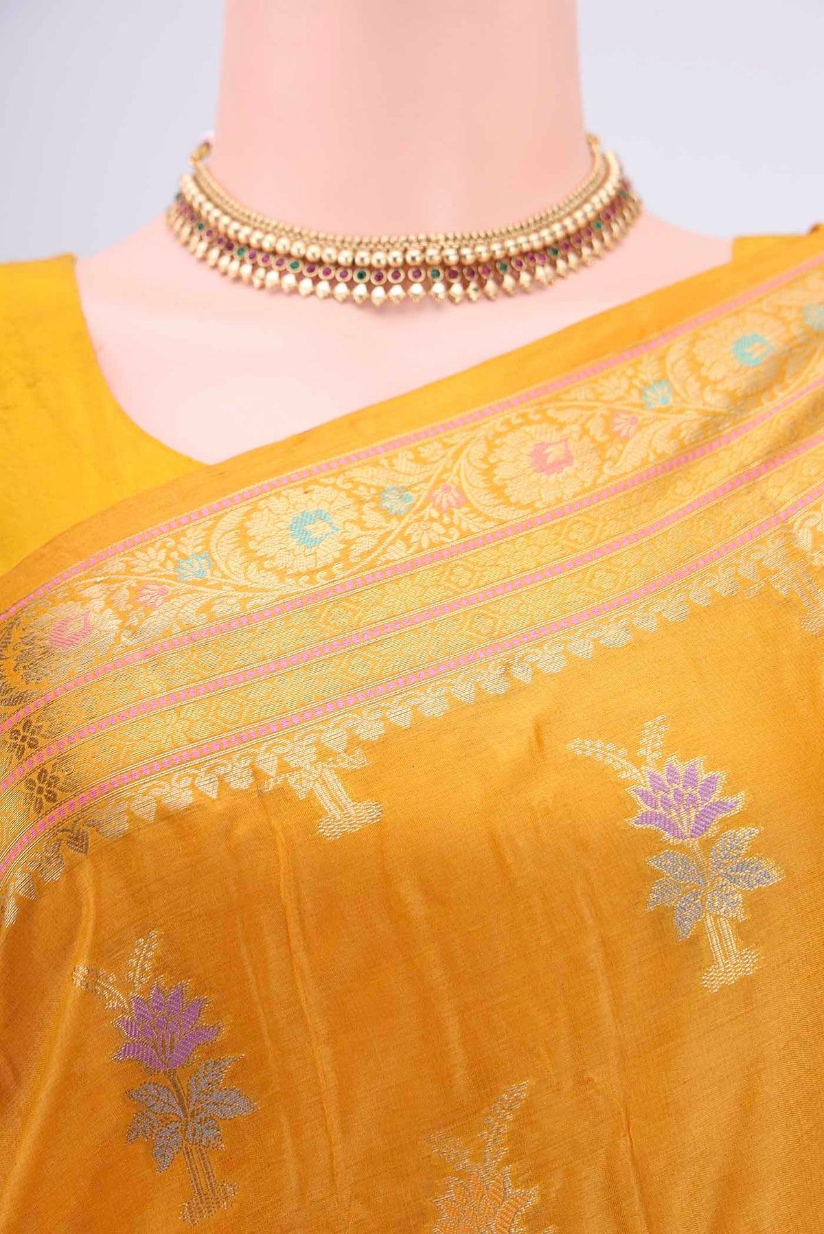 Border image of Yellow Banarasi Tussar Silk Saree with Zari And Thread Butta on the body and Zari And Thread Border. 