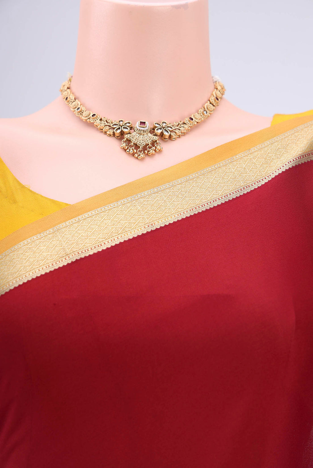 Border image of Maroon Mysore Crepe Saree with Plain Body and Zari Border. 