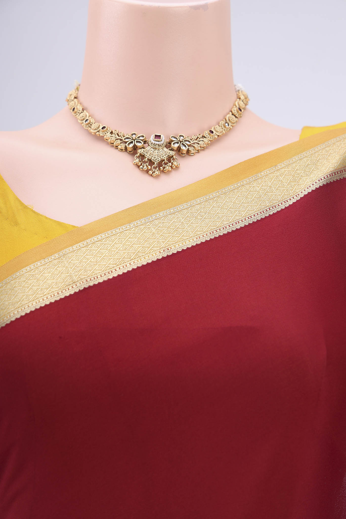 Border image of Maroon Mysore Crepe Saree with Plain Body and Zari Border. 