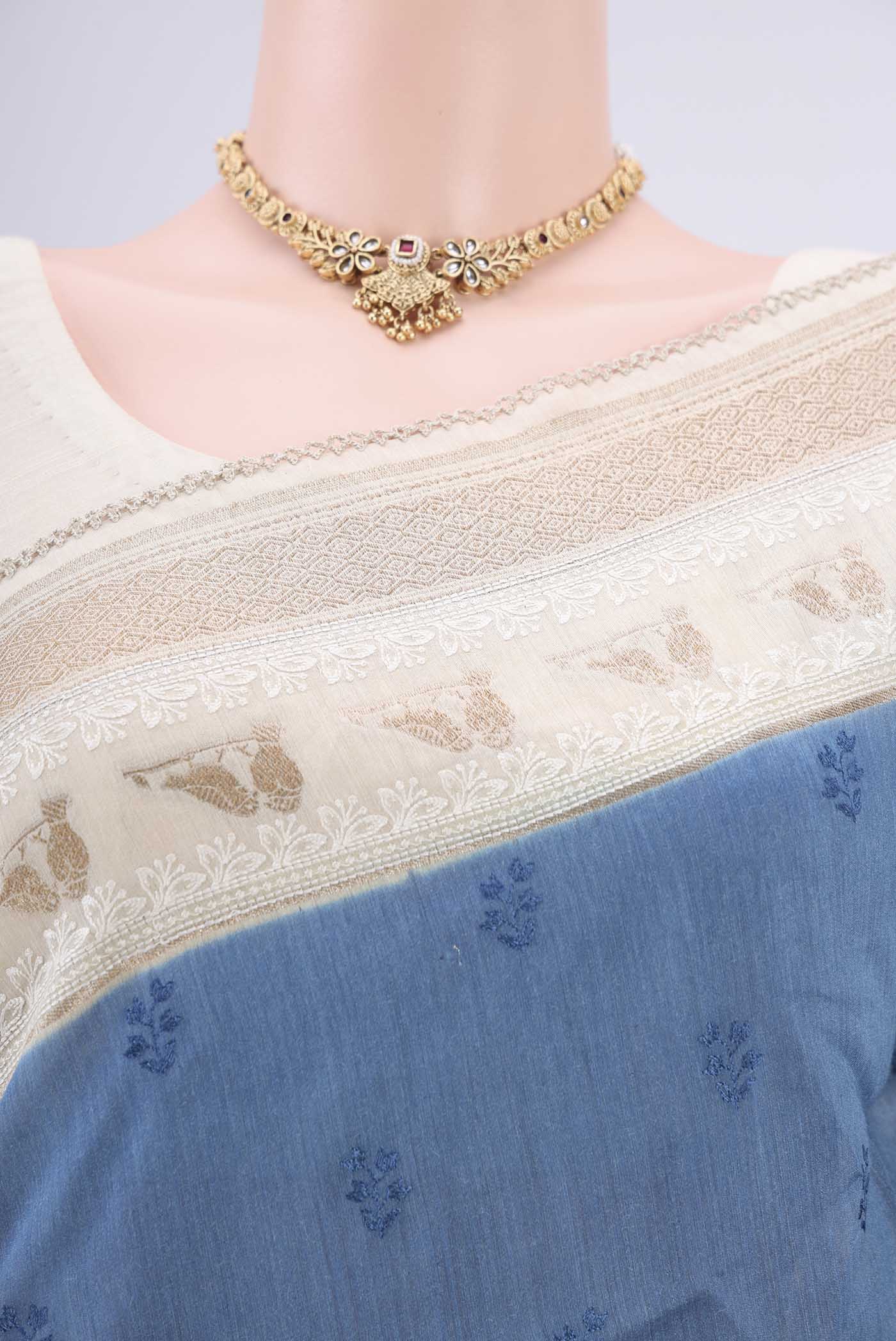 Border image of Blue MP Tussar Saree with Embroidery on the body and Zari Border. 