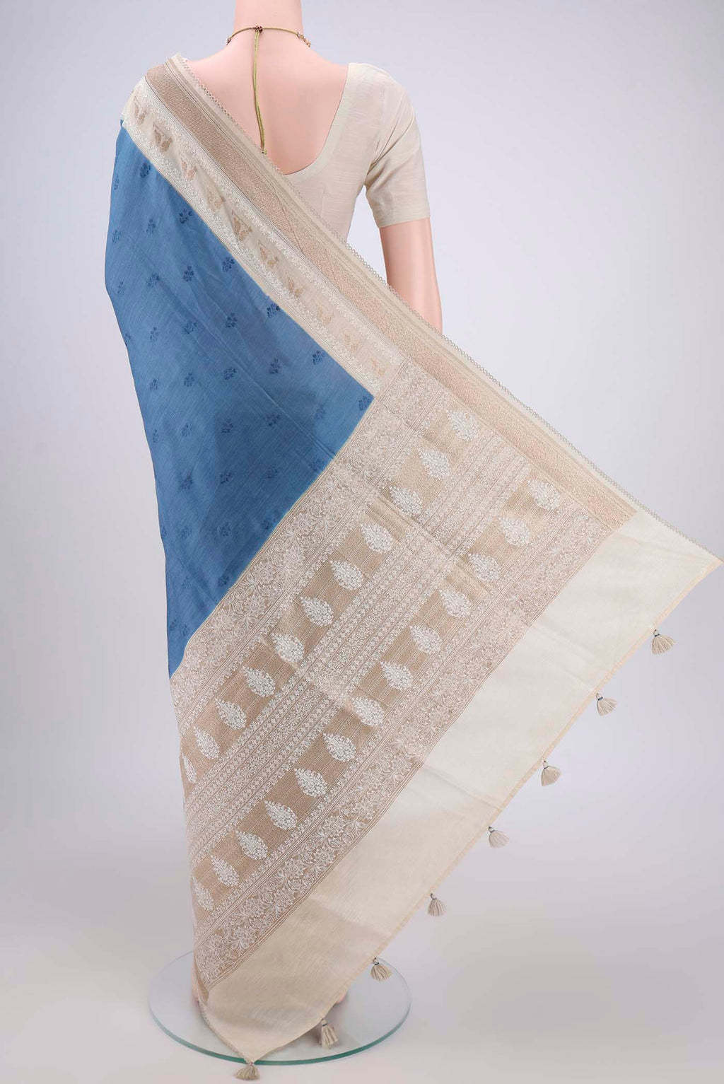 Flat view of Blue MP Tussar Saree with Embroidery on the body and Zari Border. 
