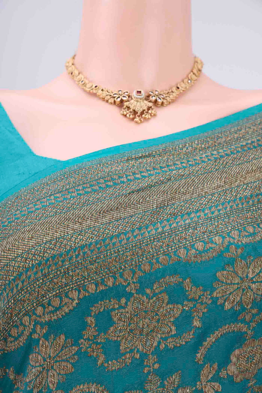 Border image of Sea Green Banarasi Georgette Saree with Zari Brocade on the body and Zari Border. 