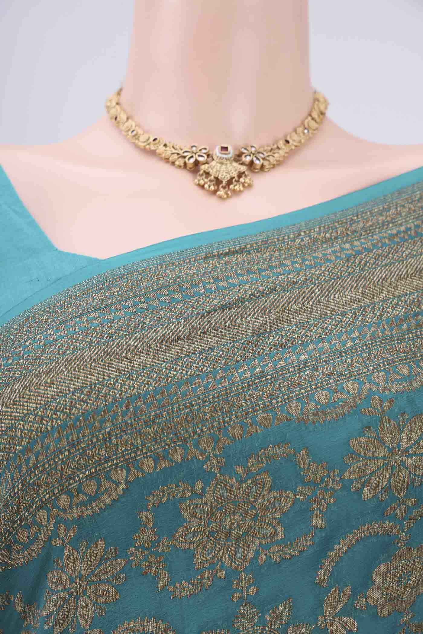 Border image of Sea Green Banarasi Georgette Saree with Zari Brocade on the body and Zari Border. 