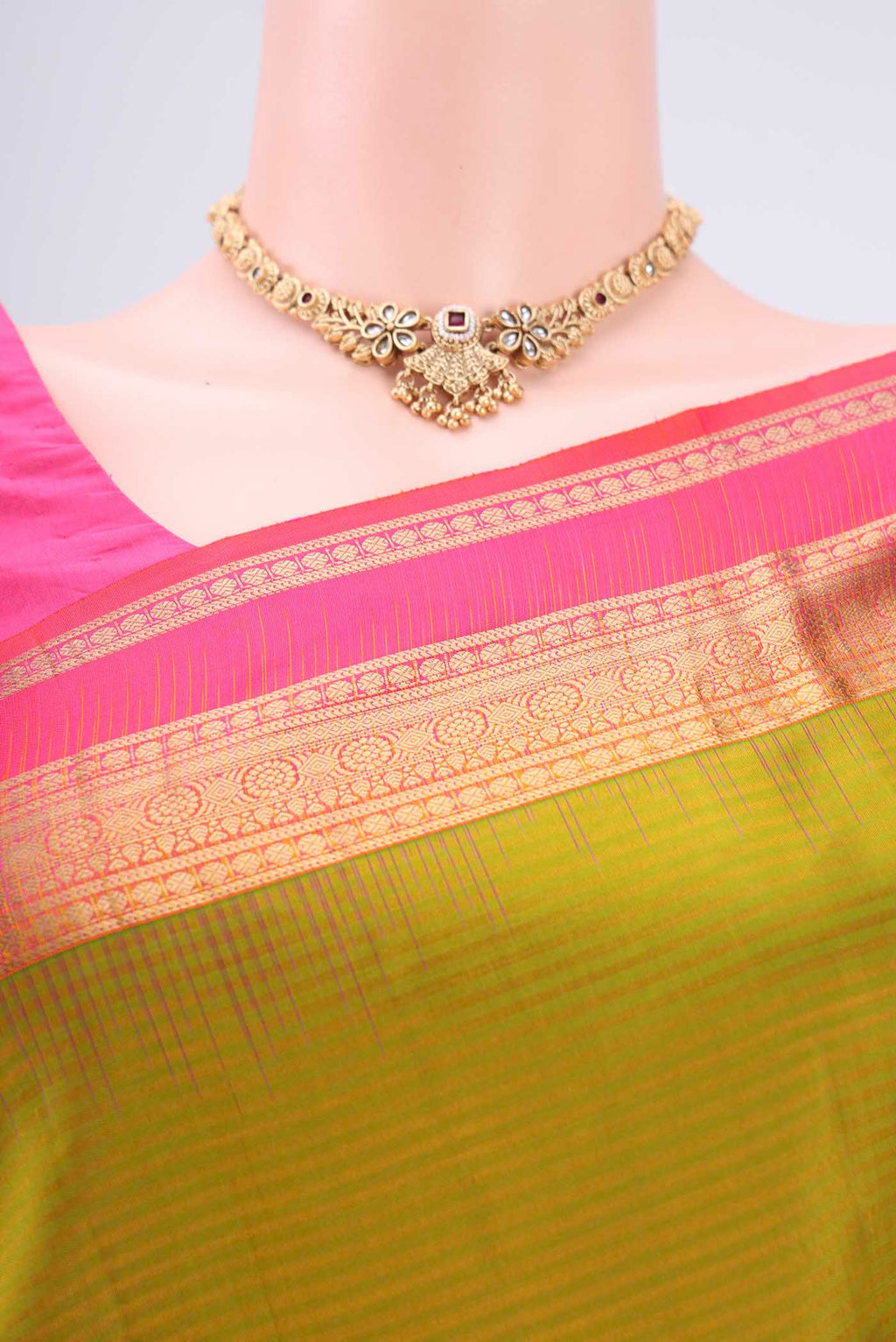 Border image of Green Kanchipuram Silk Saree with Zari Butta on the body and Zari Border. 