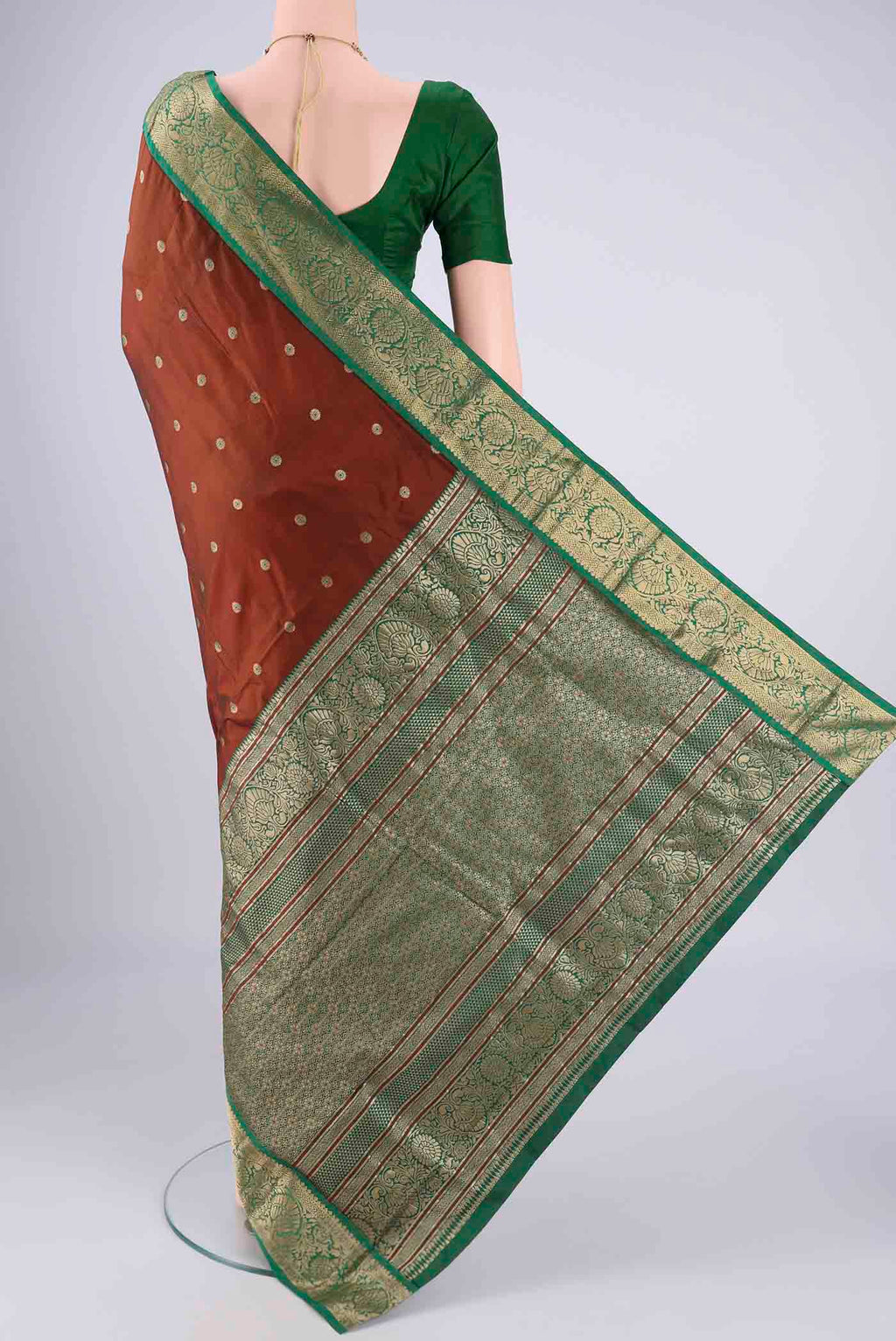 Flat view of Brown Blended Bangalore Silk Saree with Zari And Thread Butta on the body and Zari Border. 