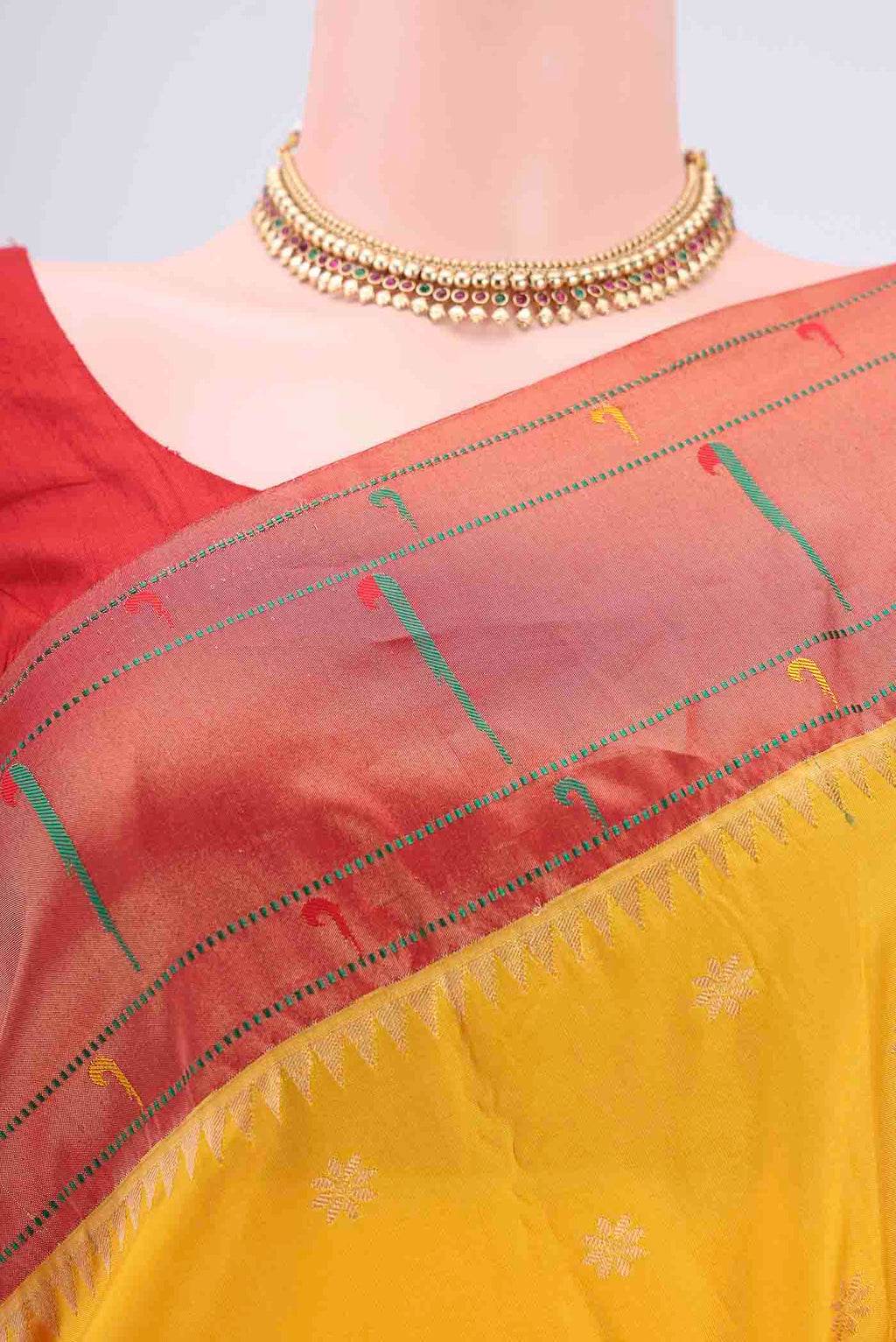 Border image of Yellow Blended Bangalore Silk Saree with Zari Butta on the body and Paithani Border. 