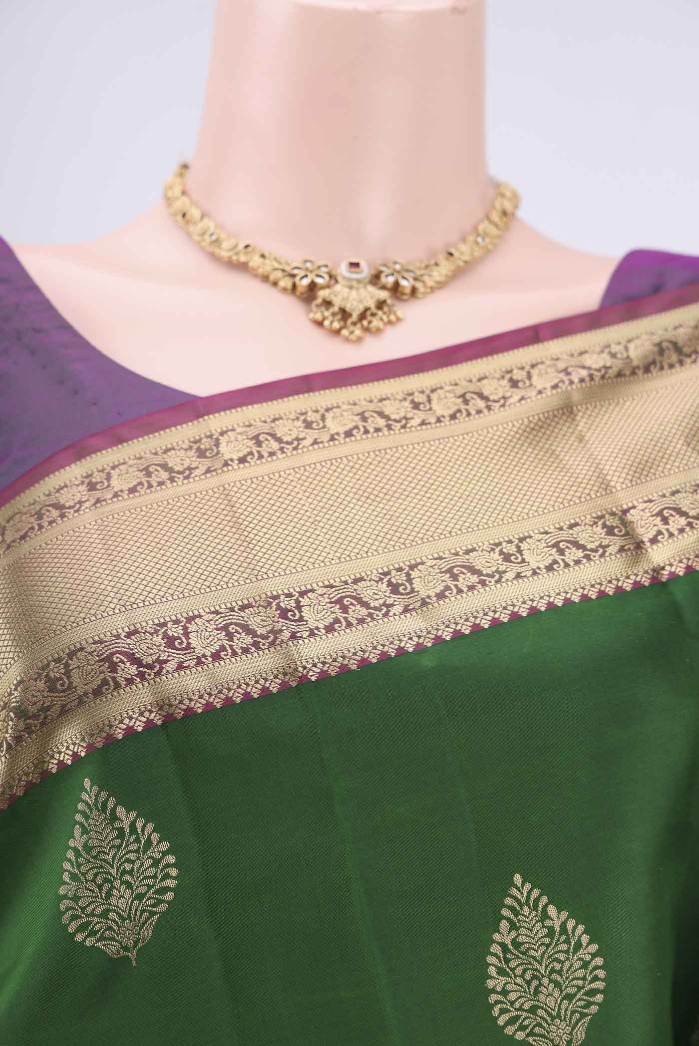 Border image of Green Soft Silk Saree with Zari Butta on the body and Zari Border. 