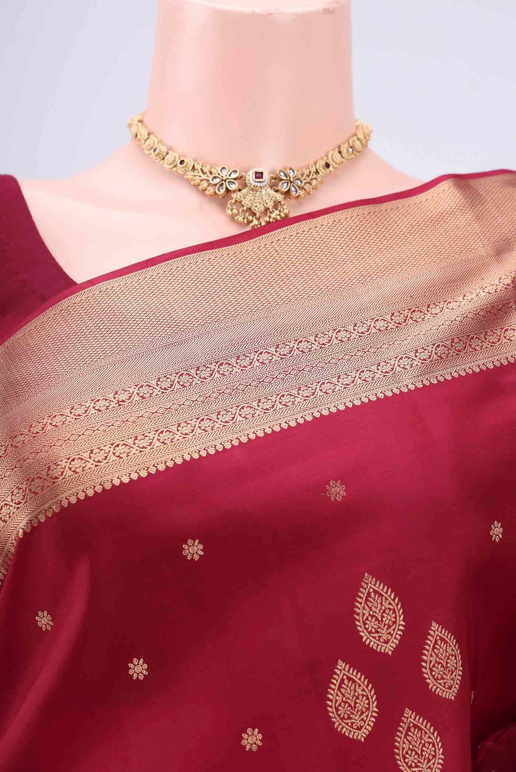 Border image of Maroon Dual Tone Soft Silk Saree with Zari Butta on the body and Zari Border. 